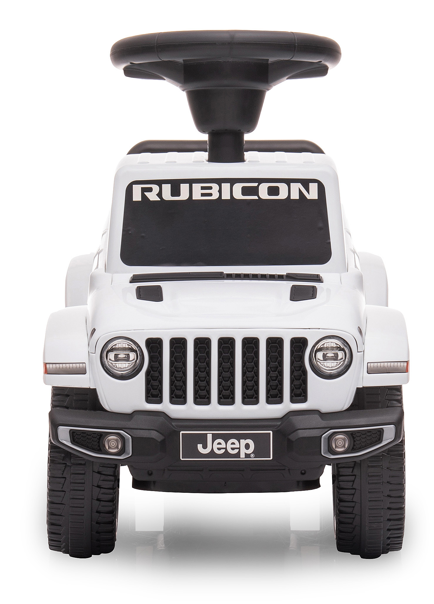 Ein weißes Jeep-Spielzeugauto mit schwarzem Lenkrad. Das Spielzeug hat ein Jeep-Logo und das Wort 'RUBICON' vorne.