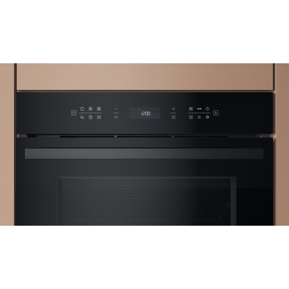 Un forno nero con display digitale che mostra le 12:00. Ha pulsanti di controllo e una porta a rete.