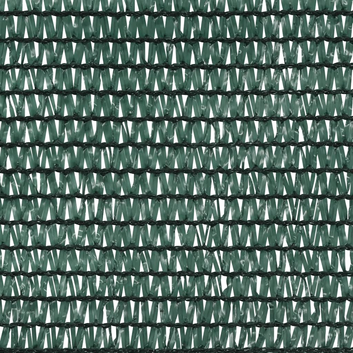 Nahaufnahme eines grünen Gewebes mit schwarzen Fäden. Das Gewebe ist dicht gemustert mit einem sich wiederholenden Design offener Räume.