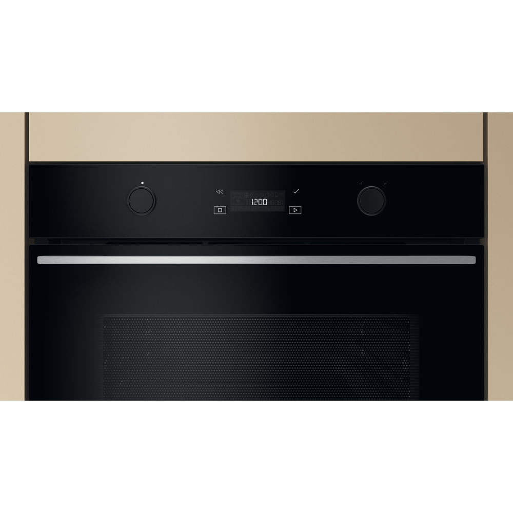 Un forno nero con due manopole di controllo, un display digitale che mostra le 12:00 e una rete rettangolare in basso.