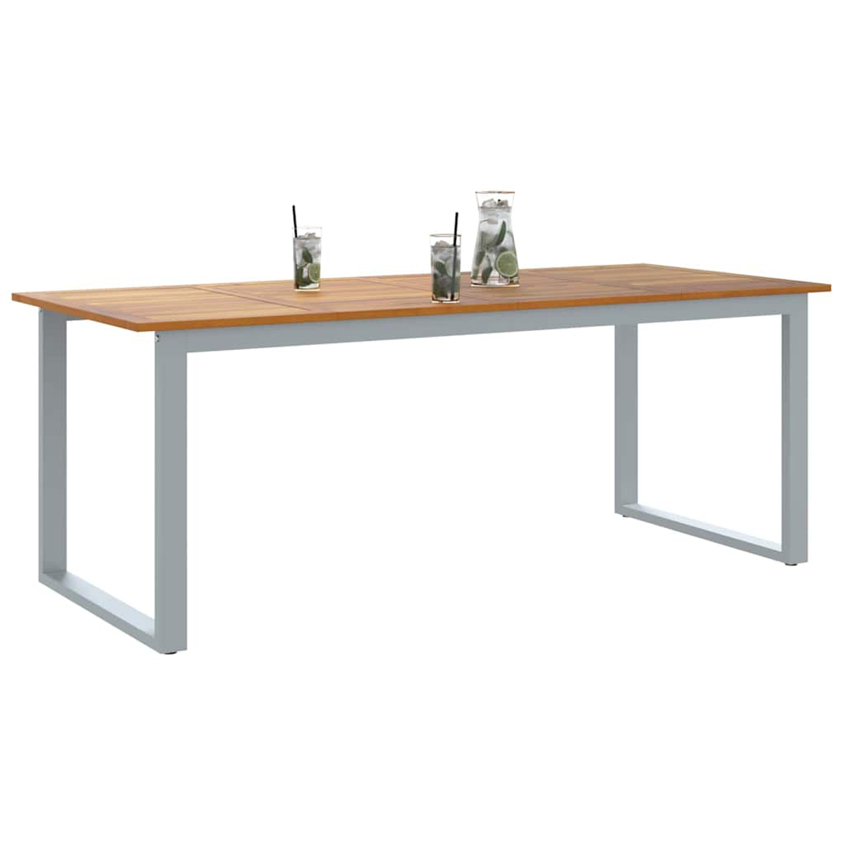 Un tavolo in legno con struttura in metallo grigio. Sul tavolo ci sono due bicchieri e una caraffa di bevanda rinfrescante.