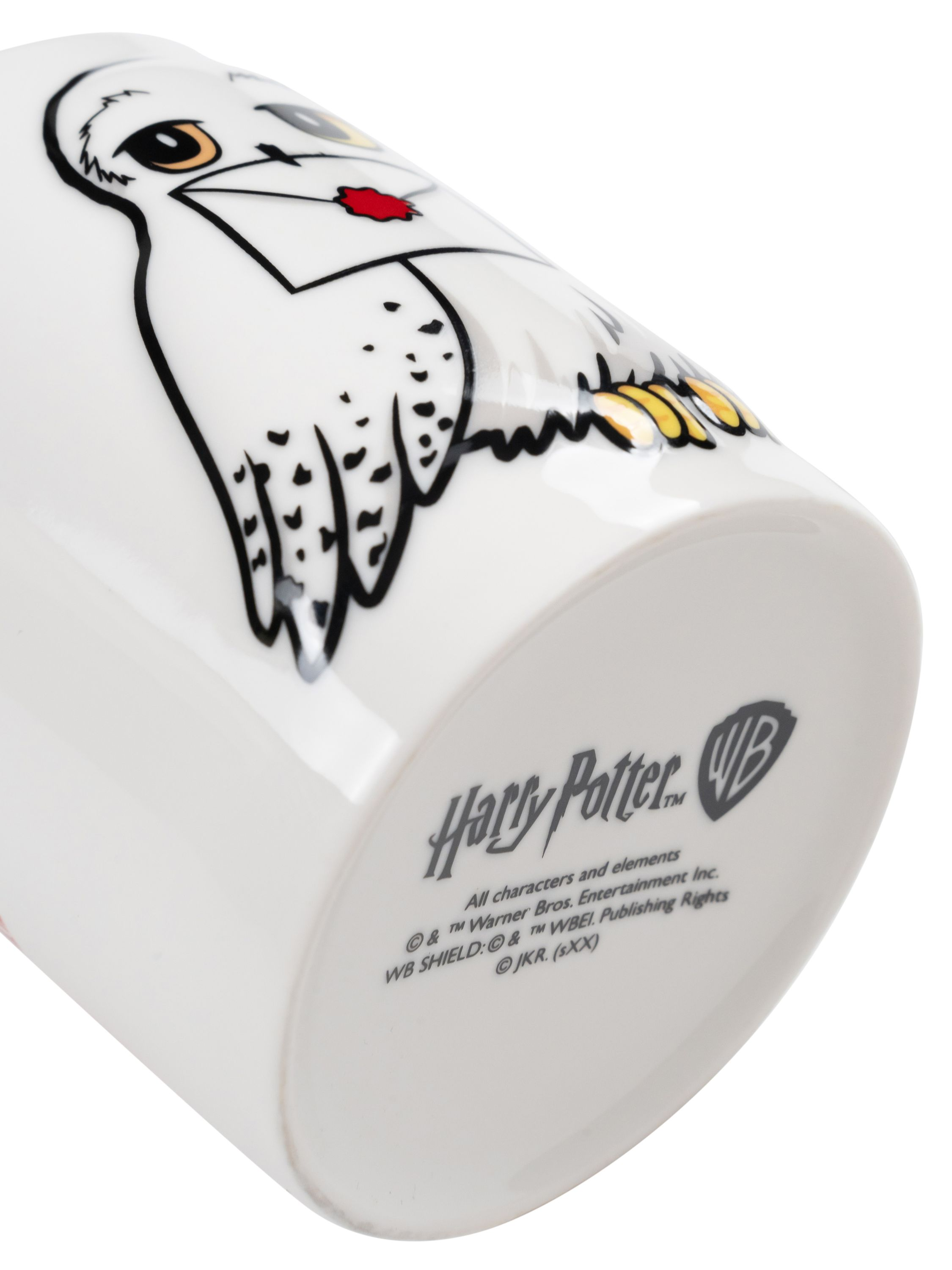 Weißer Harry-Potter-Becher mit einer Zeichnung einer Eule, die einen Brief trägt. Das WB-Logo und Text befinden sich am Boden.