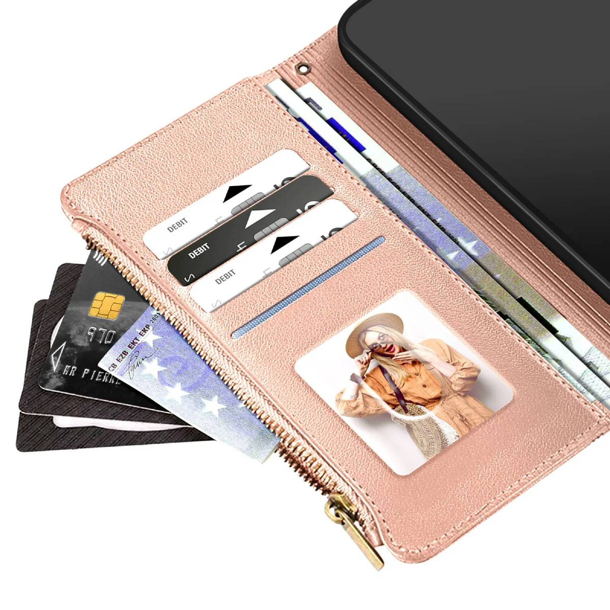 Un portafoglio rosa con carte e contanti. Ha carte di debito, carte di credito e una foto di una persona. Un telefono è visibile.
