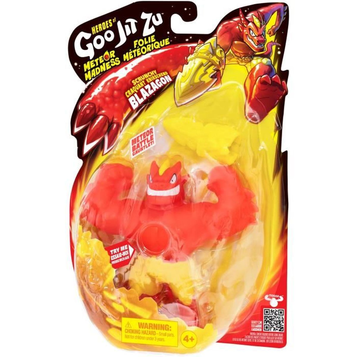 Ein verpacktes Spielzeug. Eine rote und gelbe Blazagon-Figur steht im Mittelpunkt. Die Verpackung enthält Text und ein Warnetikett.