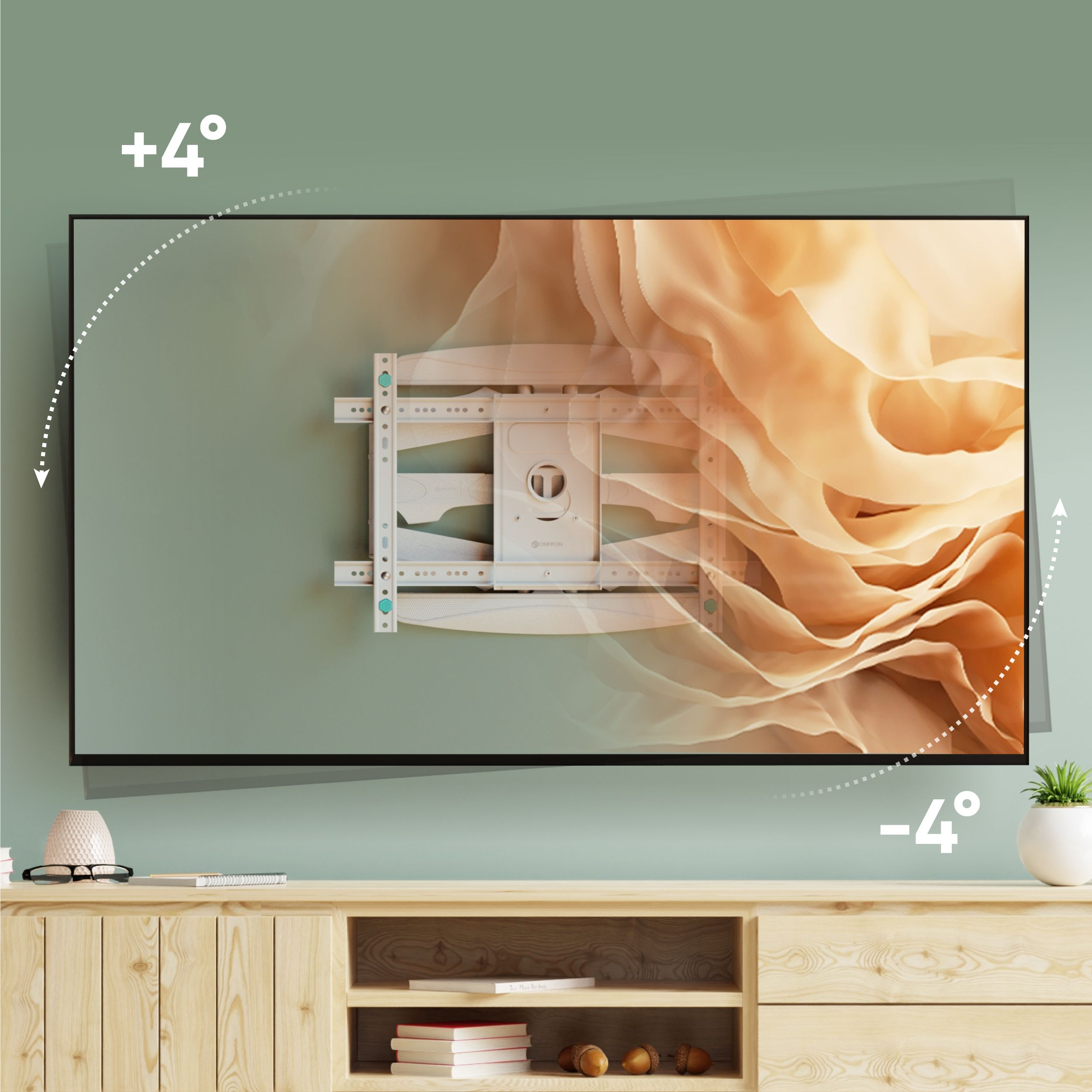 Telewizor zamontowany na ścianie z uchwytem. Ściana jest zielona. Pod telewizorem znajduje się drewniana szafka.