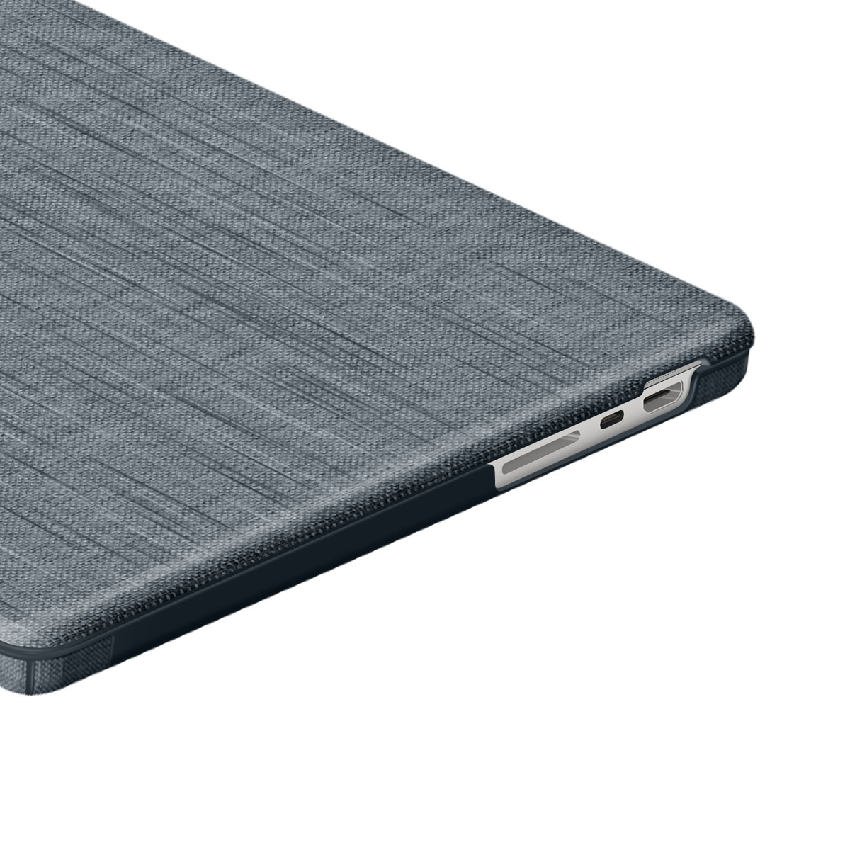 È mostrato l'angolo di un dispositivo rivestito in tessuto grigio, con cornice scura. Visibile il lato con porte e bordo chiaro.