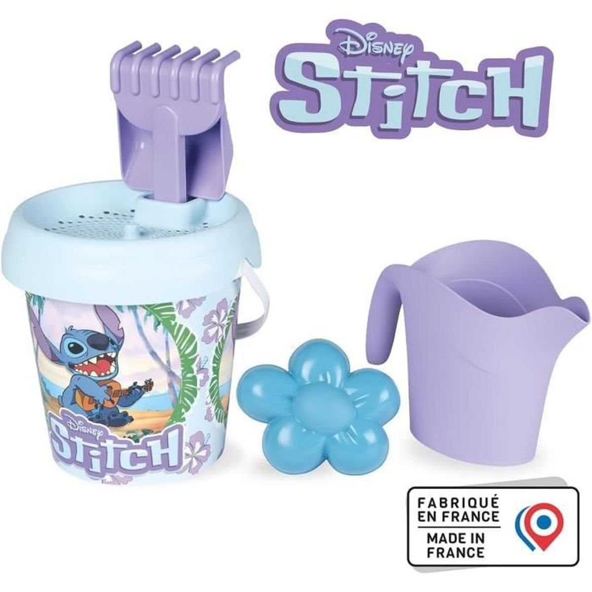 Zestaw zabawek plażowych Stitch: wiaderko, grabki, konewka, kwiat i obrazek Stitch. Wszystkie zabawki są fioletowe i niebieskie. Wyprodukowano we Francji.