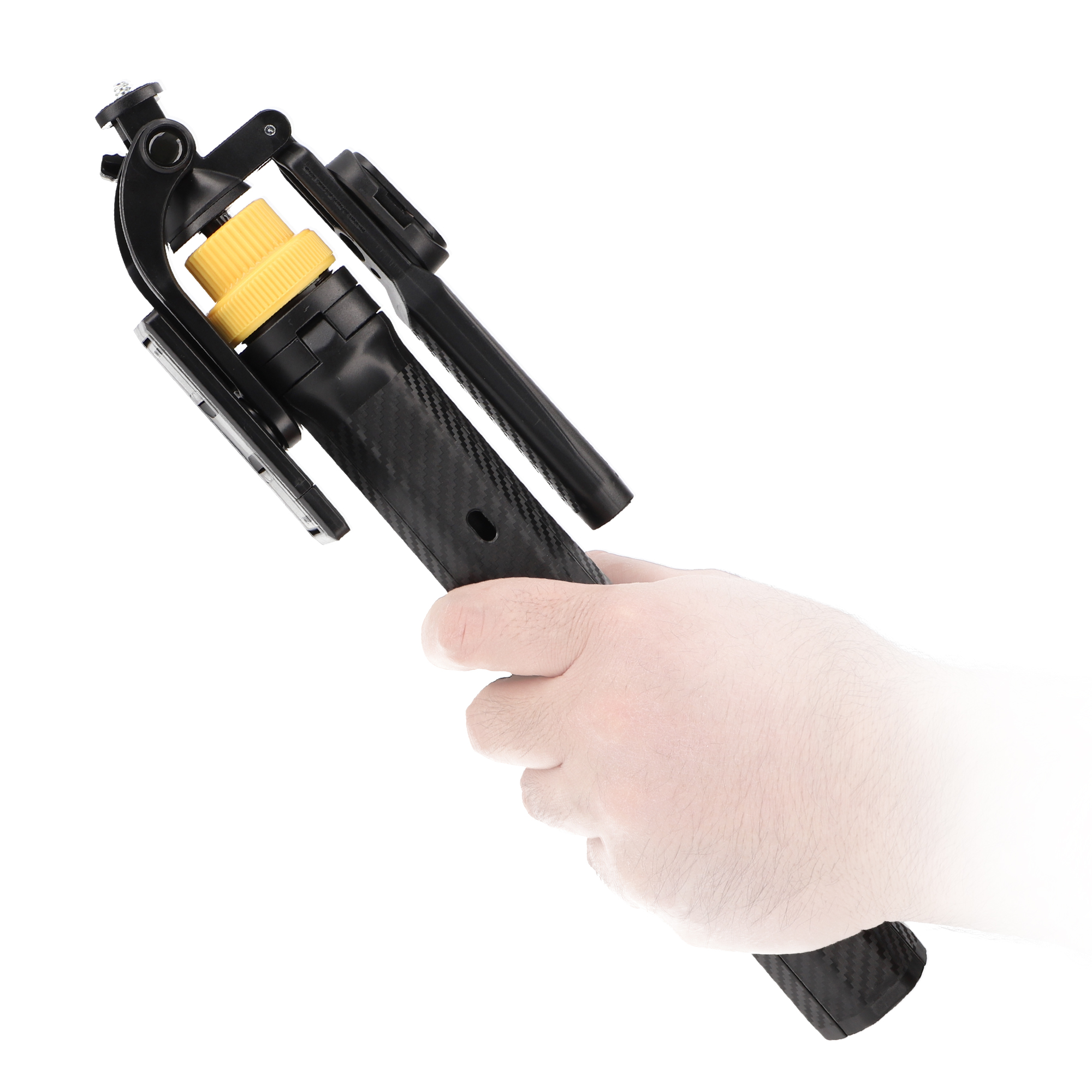 Hand hält ein schwarzes Kamerastativ mit gelbem Einstellknopf, isoliert auf wei ßem Hintergrund.
