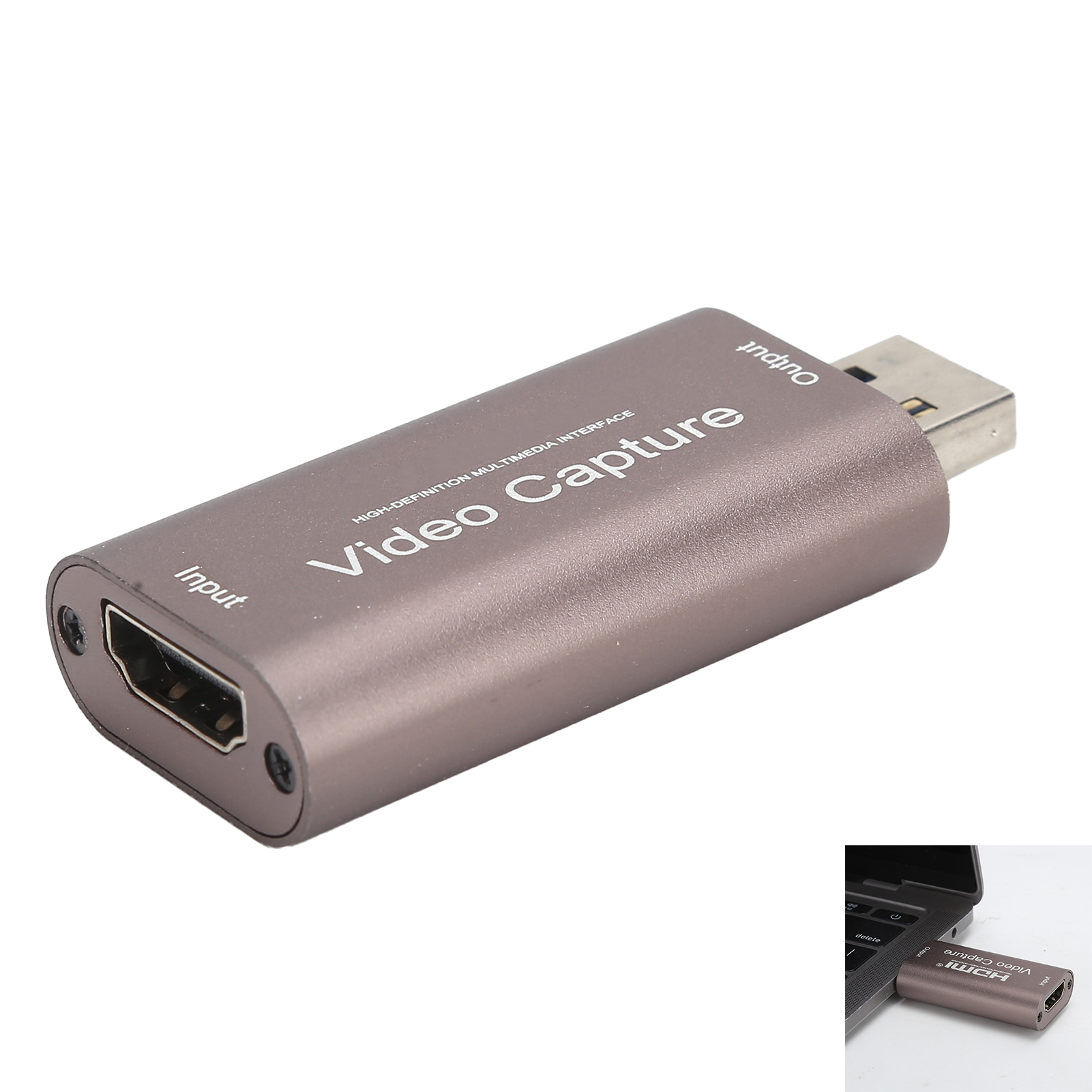 Ein graues Videoaufnahmegerät mit HDMI-Eingang und USB-Ausgang vor weißem Hintergrund.