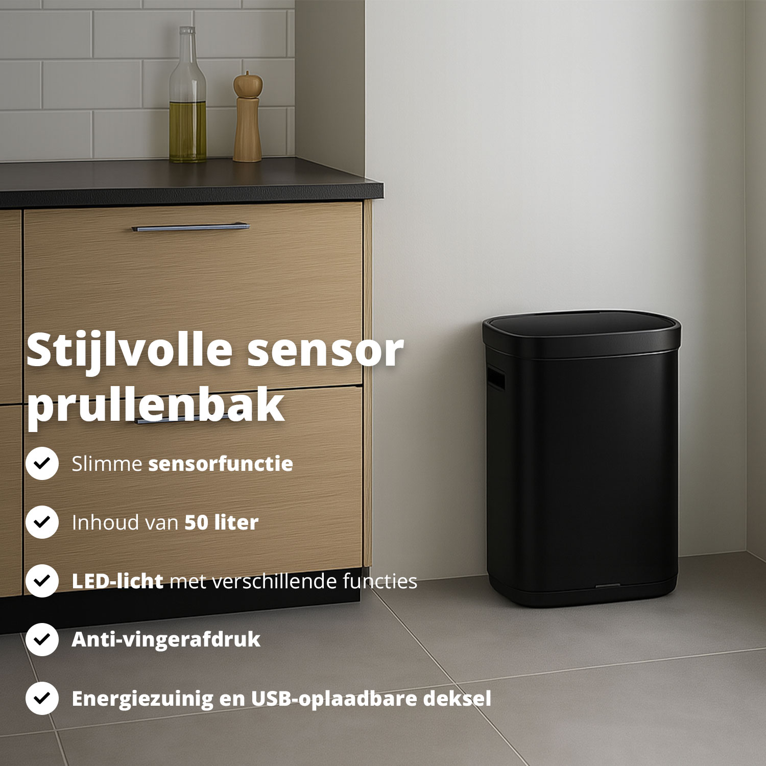 A black sensor trash can stands next to a wooden cabinet. A bottle of oil and a pepper grinder are on the counter.