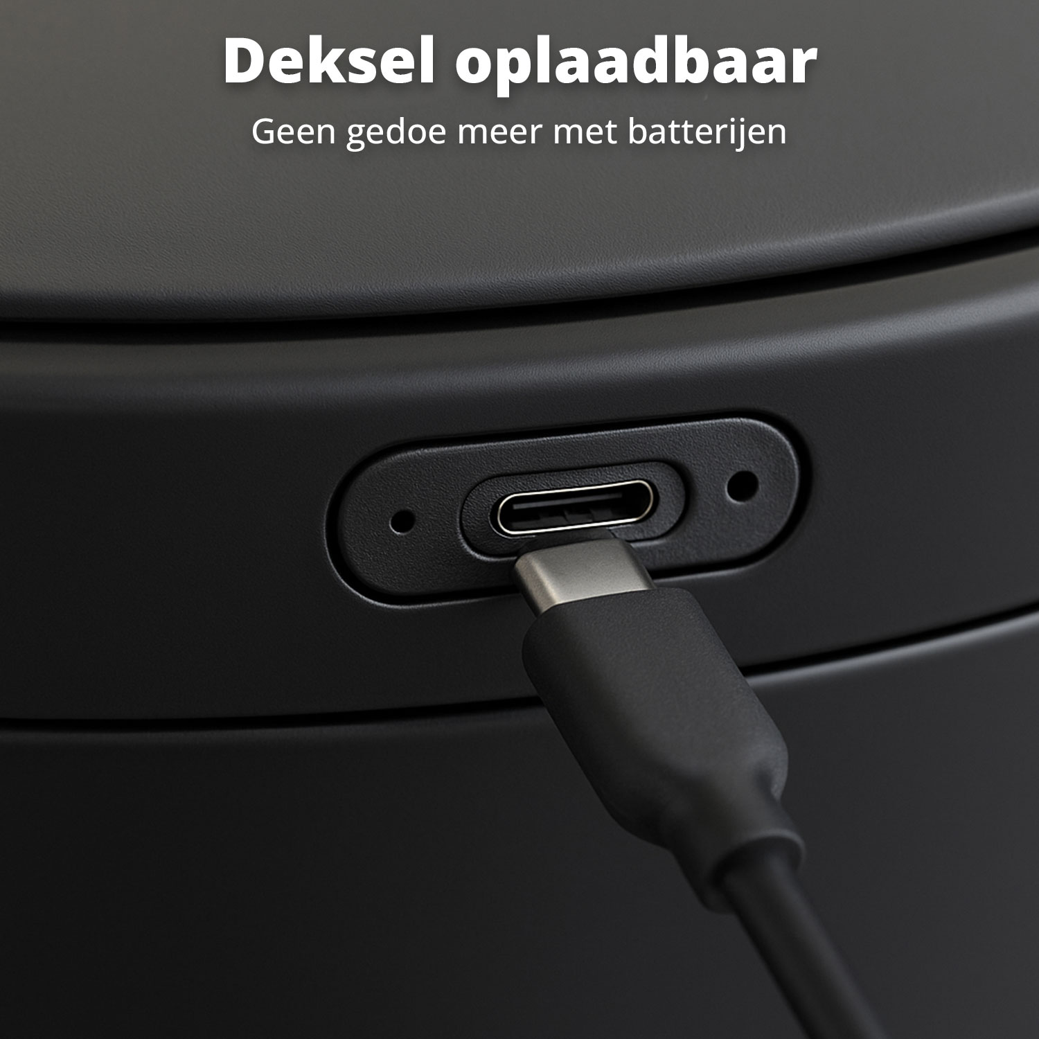 Close-up of a black device with a USB-C port and a charging cable plugged in. The text above says: Lid rechargeable.