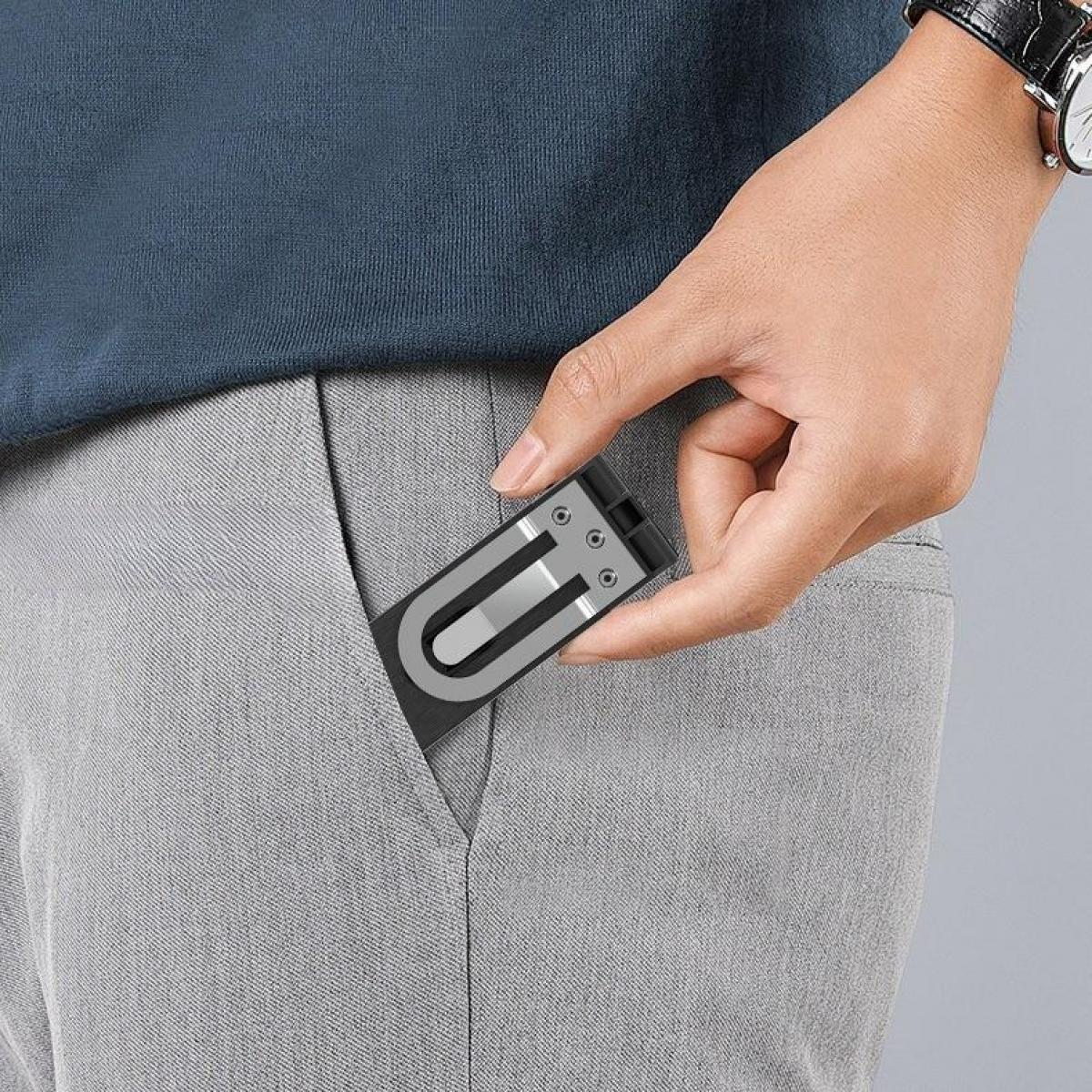 Die Hand einer Person hält einen schwarz-silbernen Telefonständer. Der Ständer ist teilweise in einer Tasche, die Person trägt eine Uhr.