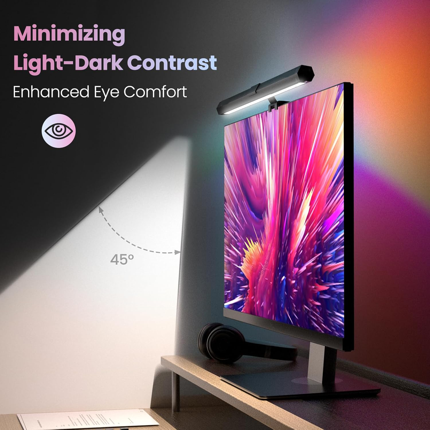Un monitor con una barra luminosa, testo in alto e un'icona dell'occhio. Lo schermo mostra arte astratta colorata. Le cuffie sono su uno scaffale.