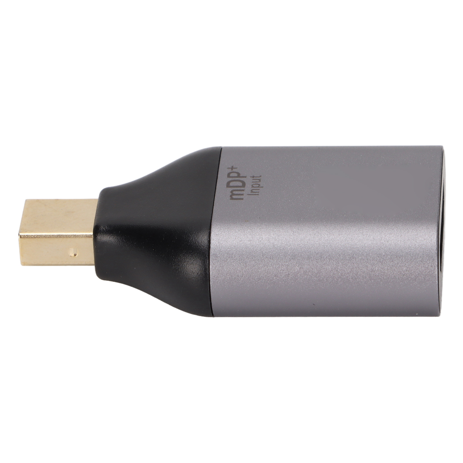 Ein silberner und schwarzer mDP+ Input Adapter. Der goldfarbene Stecker befindet sich links. Weißer Hintergrund.
