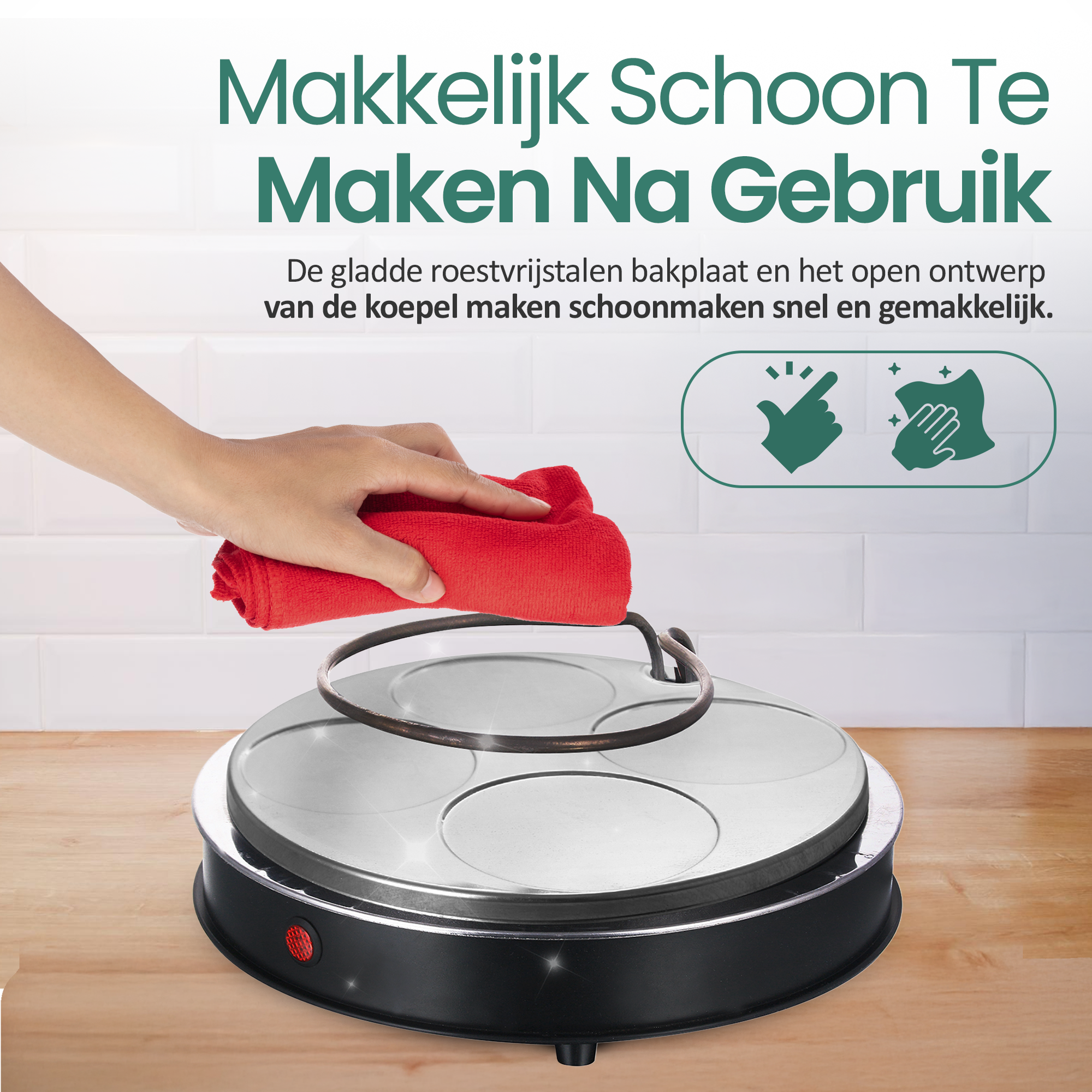 A hand cleans a cooking surface with a red cloth. The surface is part of a black appliance.