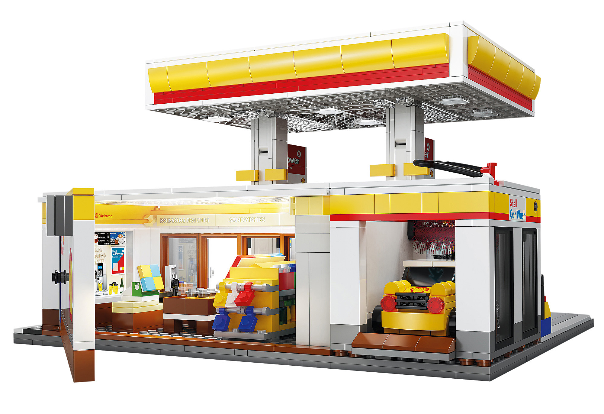 Eine LEGO Shell-Tankstelle mit Waschanlage. Ein gelbes Auto befindet sich in der Waschanlage. Es gibt einen Laden und Zapfsäulen.
