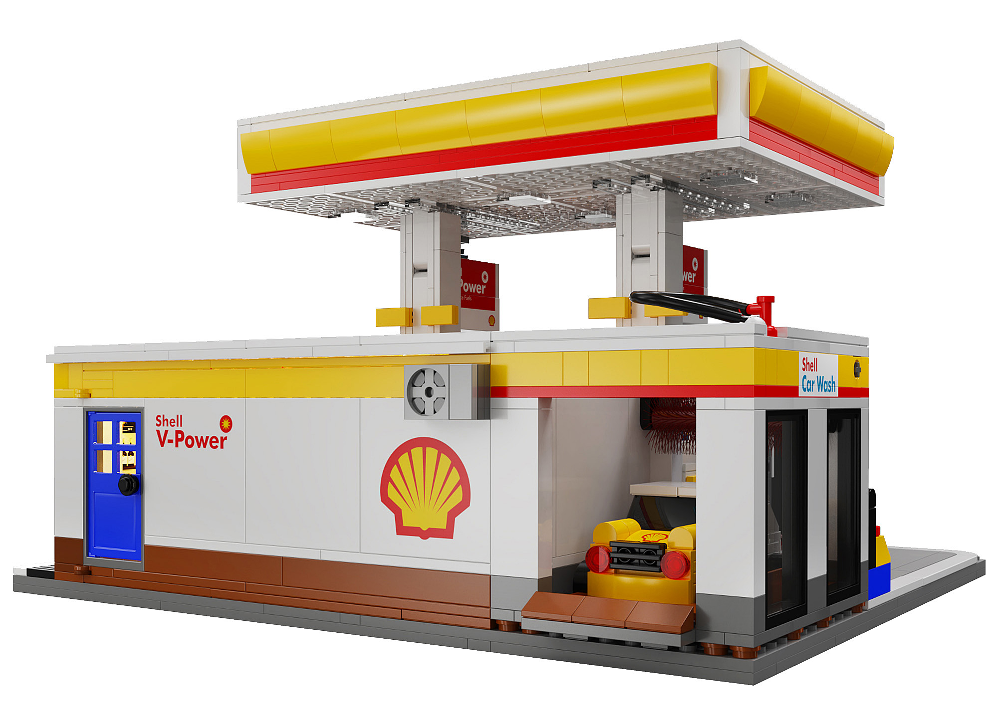 Eine Lego Shell-Tankstelle mit gelbem Vordach, roten Akzenten und dem Shell-Logo. Eine Waschbox ist sichtbar.