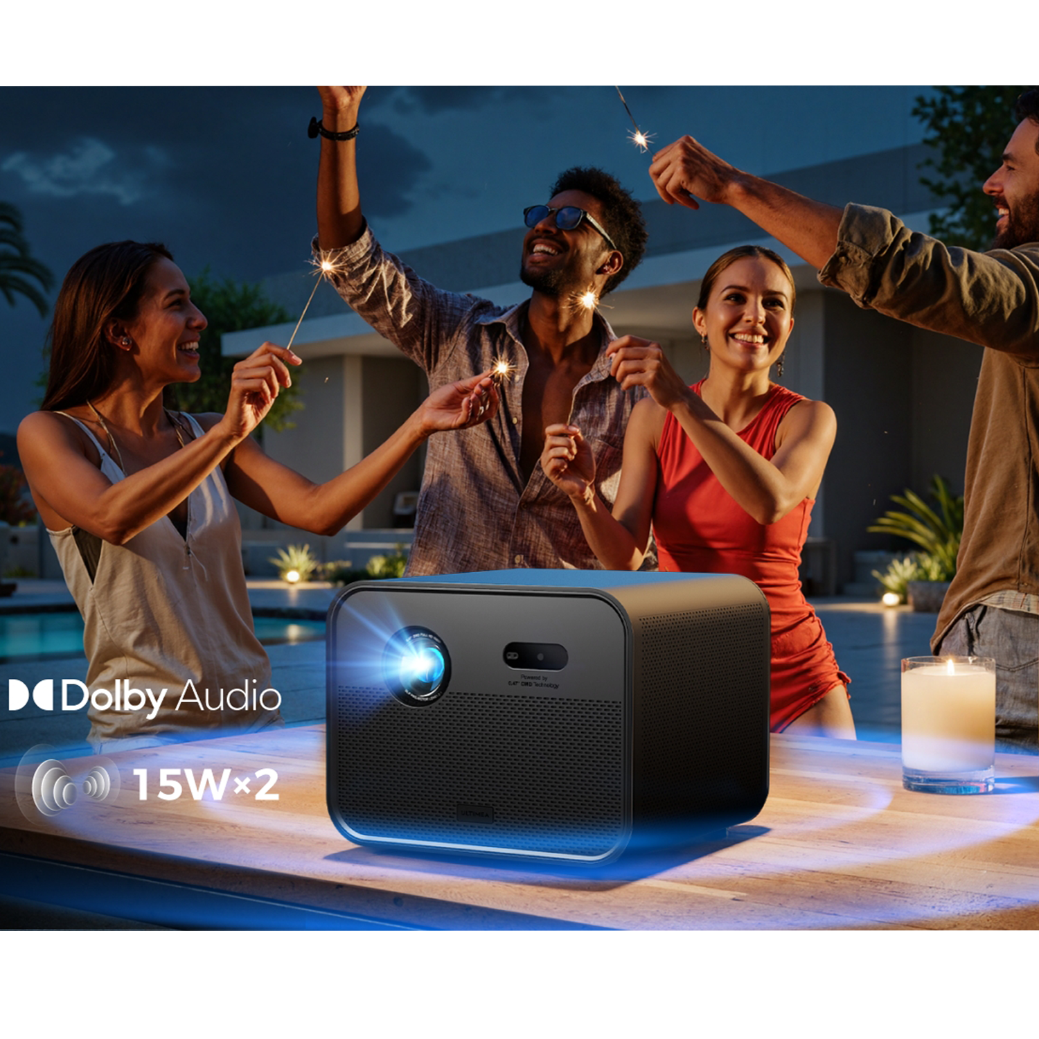 Group of friends celebrating with sparklers near a projector on a table. Dolby Audio and 15W x 2 are visible.