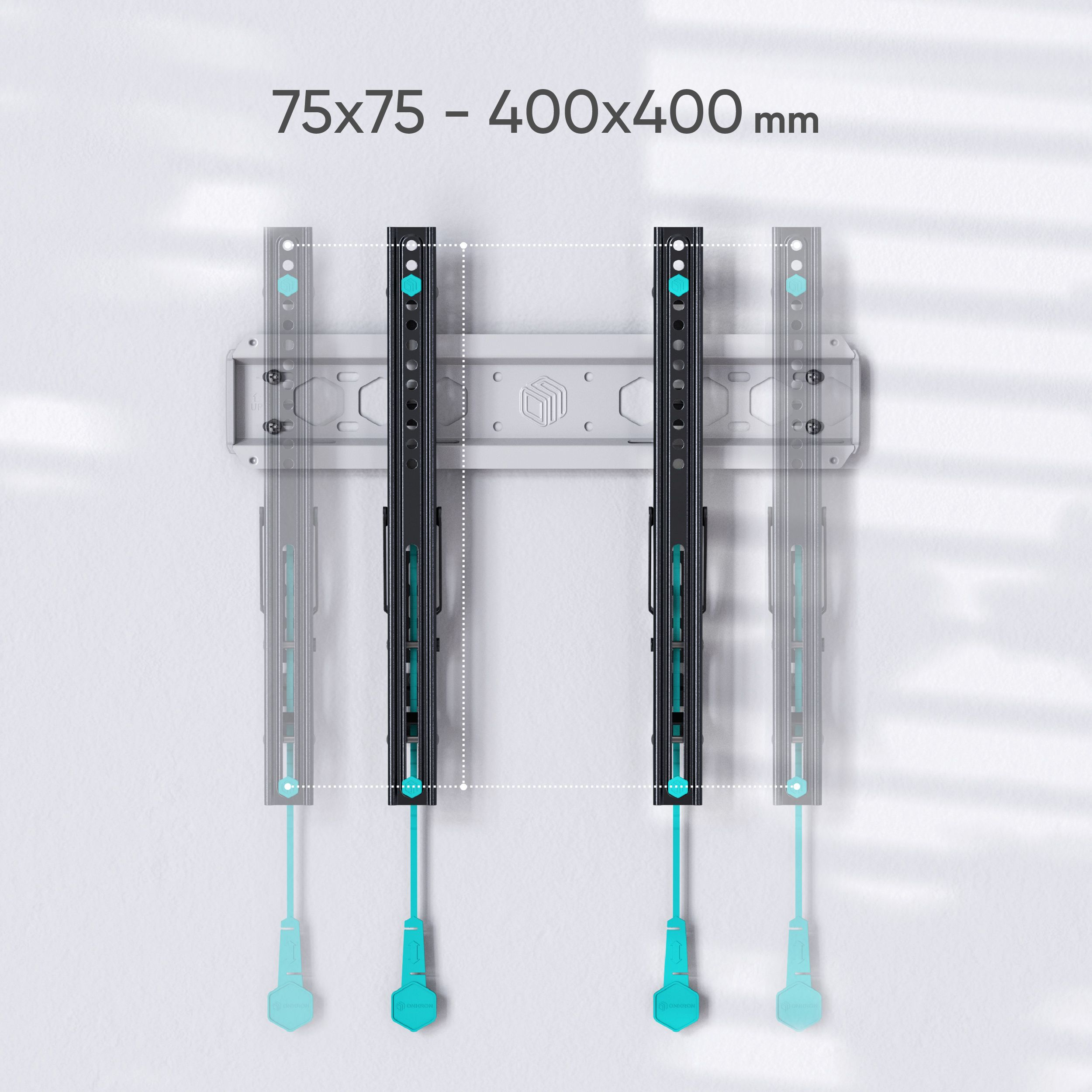 Zdjęcie przedstawia uchwyt do telewizora na białej ścianie. Ma czarne pionowe podpory i turkusowe blokady regulacyjne.