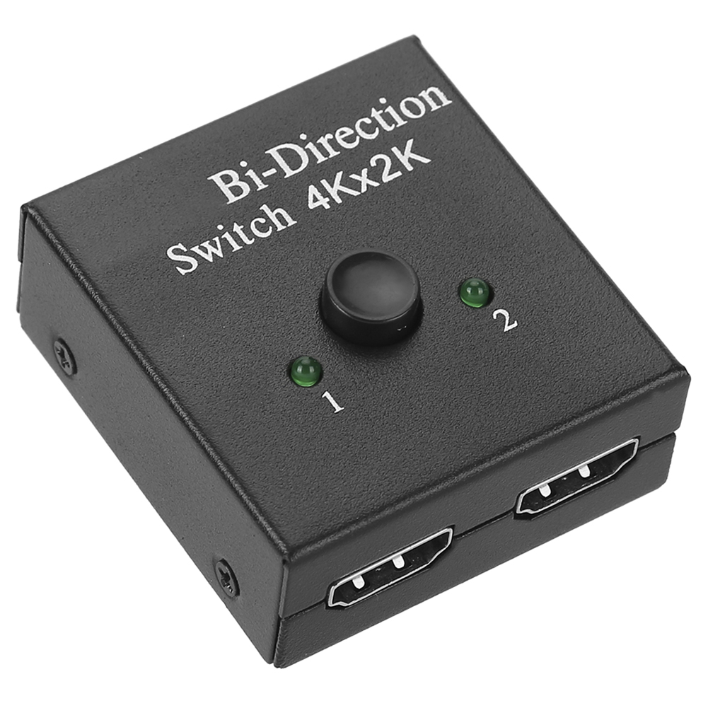 Ein schwarzes Bi-Direction Switch 4Kx2K Gerät. Es hat einen Knopf, zwei grüne Lichter und zwei HDMI-Anschlüsse. Text oben sagt 'Bi-Direction Switch'.
