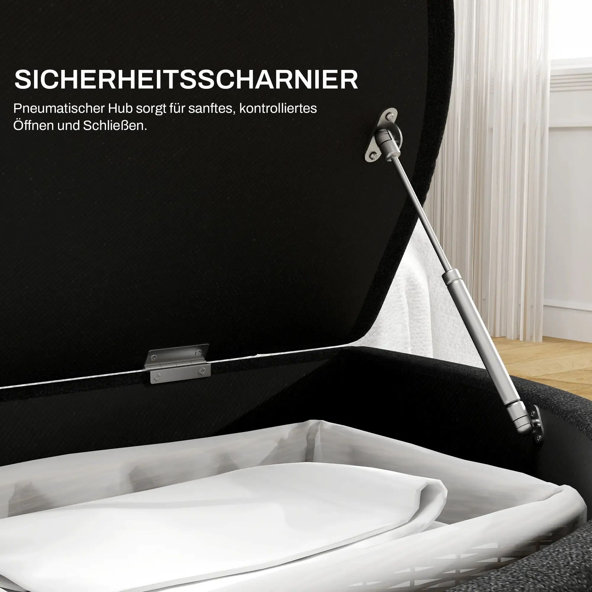 Geöffnete schwarze Truhe mit silbernem Scharnier und pneumatischem Arm, die weißen Stoff zeigt.