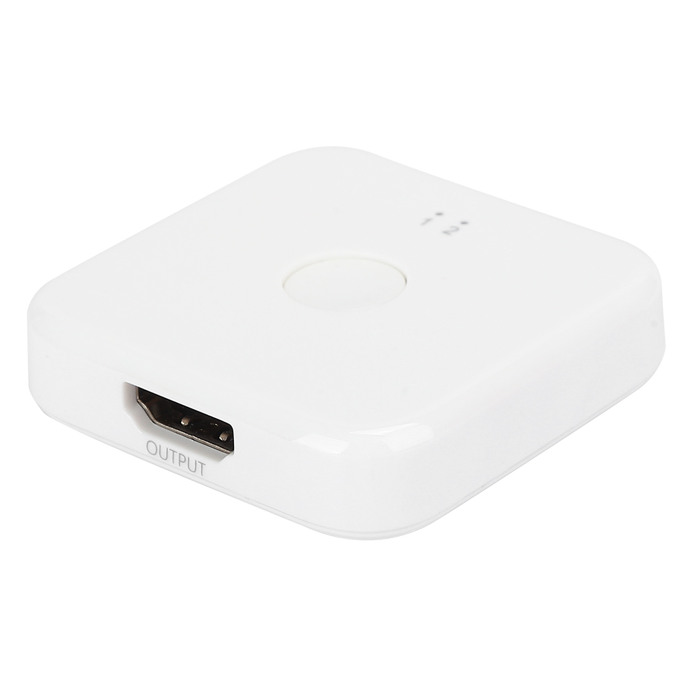 Ein weißes quadratisches Gerät mit einem HDMI-Anschluss mit der Aufschrift 'OUTPUT'. Es hat einen Knopf und zwei kleine Anzeigen oben.
