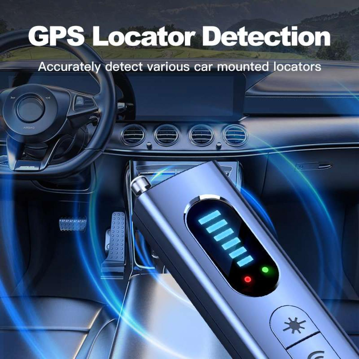 Ein blaues Gerät detektiert GPS-Ortungsgeräte im Auto. Anzeige zeigt Akku- und Detektionsstatus. Armaturenbrett, Lenkrad sind sichtbar.