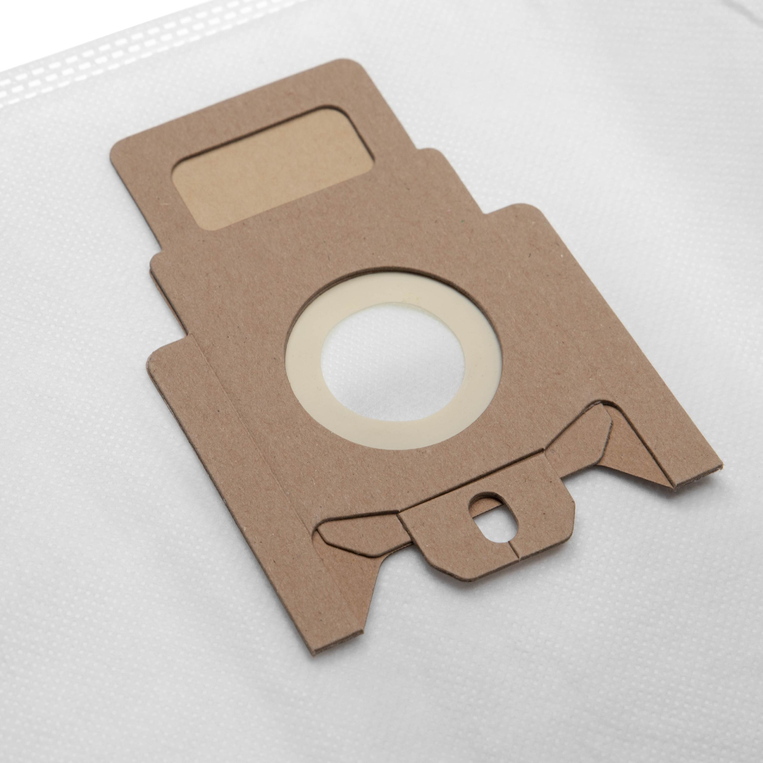 Ein brauner Staubsaugerfilter aus Pappe liegt auf weißem Hintergrund. Der Filter hat eine runde Öffnung mit weißem Filter.