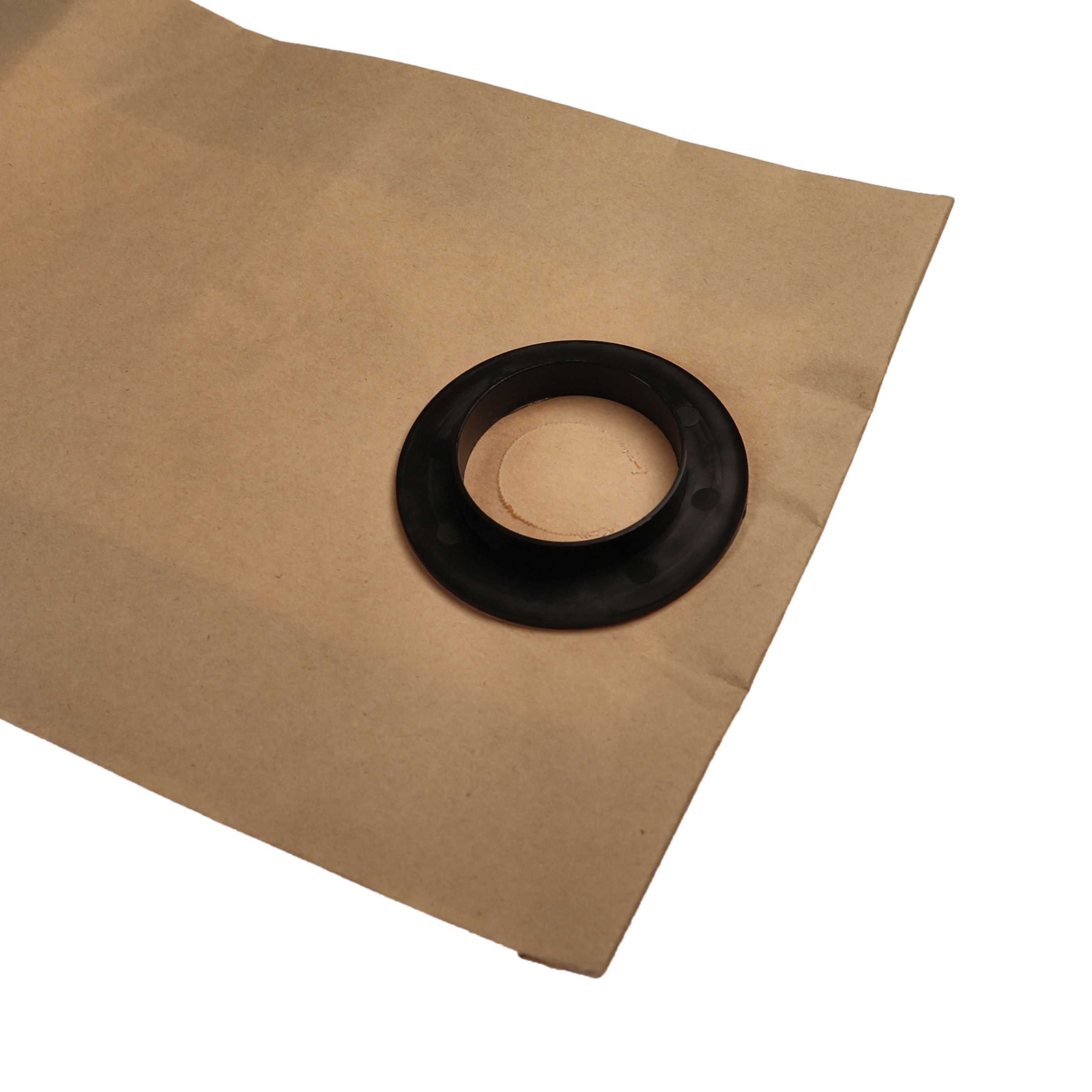Braunes Papier mit einem schwarzen Gummiring in der Mitte. Der Ring ist kreisförmig mit einem Loch in der Mitte.