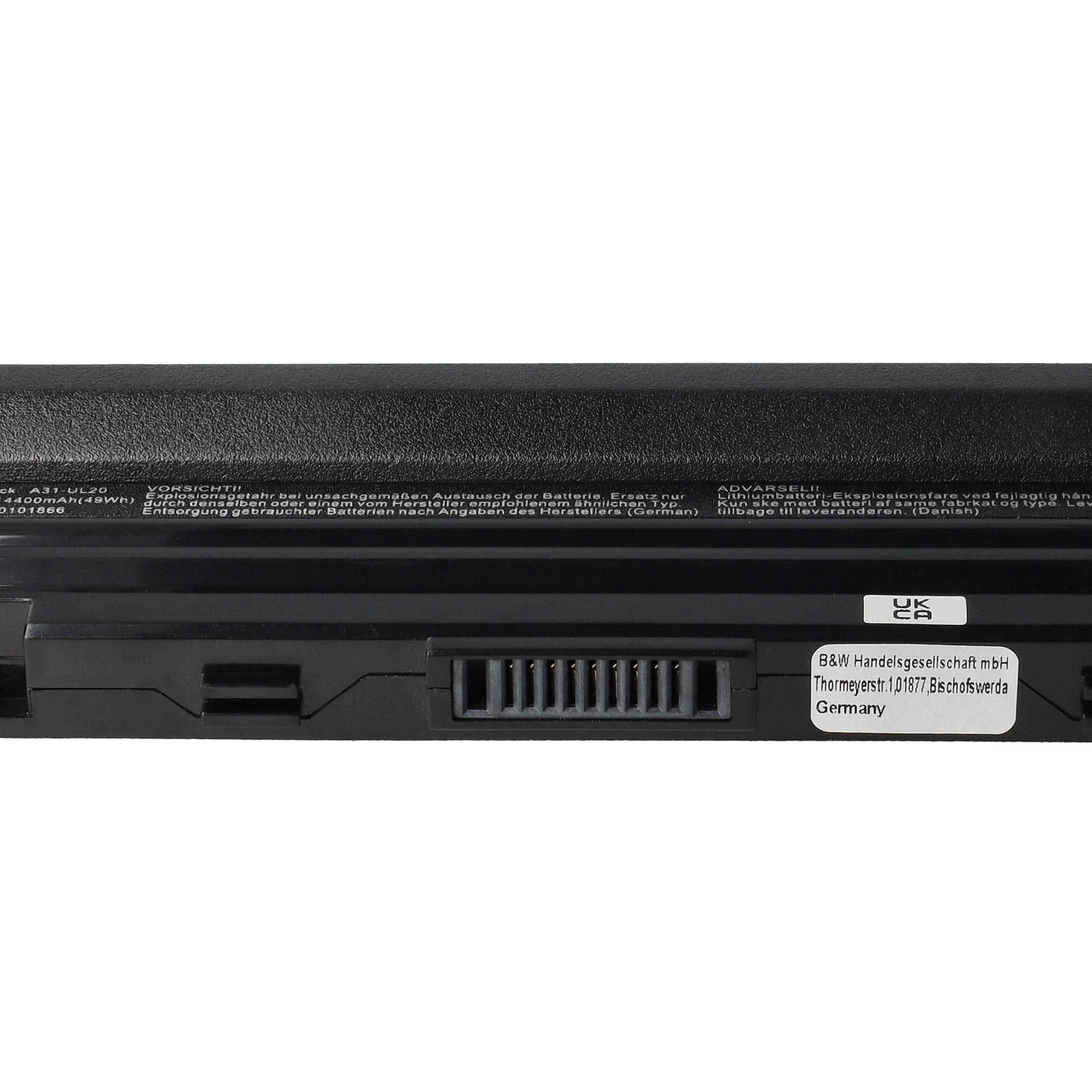 Schwarzer Laptop-Akku mit Warnhinweisen und Herstellerangaben. Enthält Text in mehreren Sprachen.