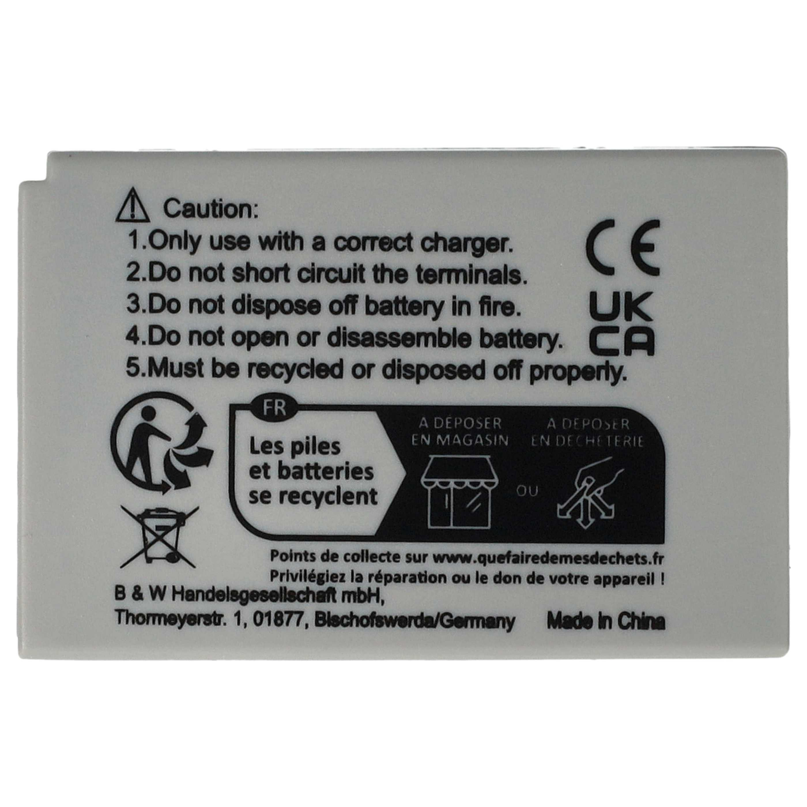 Weißer Akku mit Sicherheitshinweisen, Recycling-Symbolen und CE/UK/CA-Zeichen. Text auf Französisch und Englisch. Hergestellt in China.