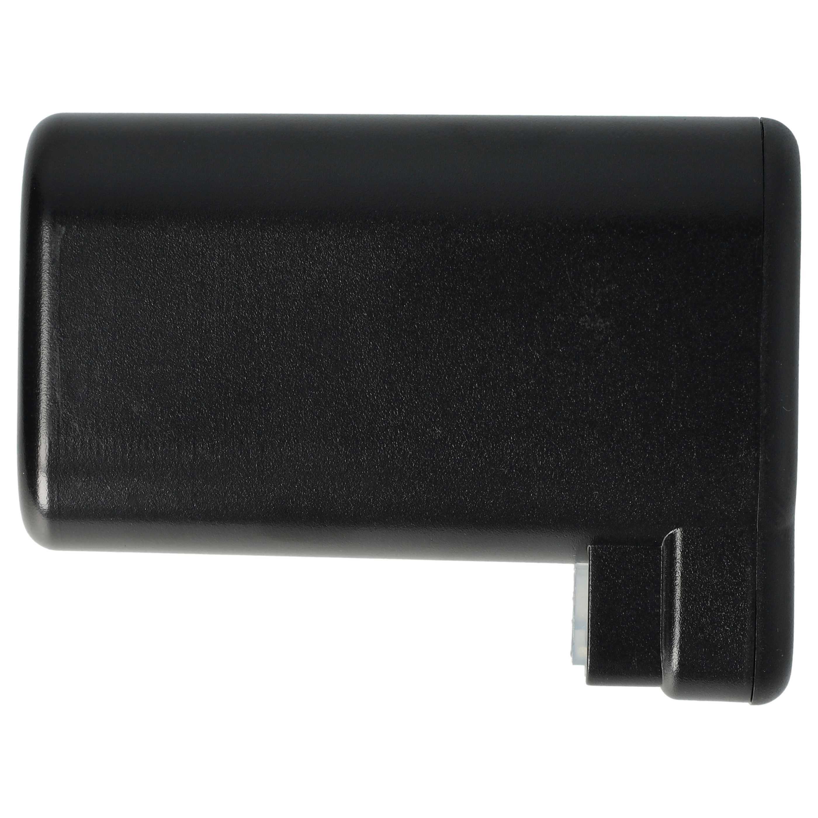 Ein schwarzes, rechteckiges Objekt mit abgerundeten Ecken, möglicherweise eine Batterie oder Komponente, vor weißem Hintergrund.