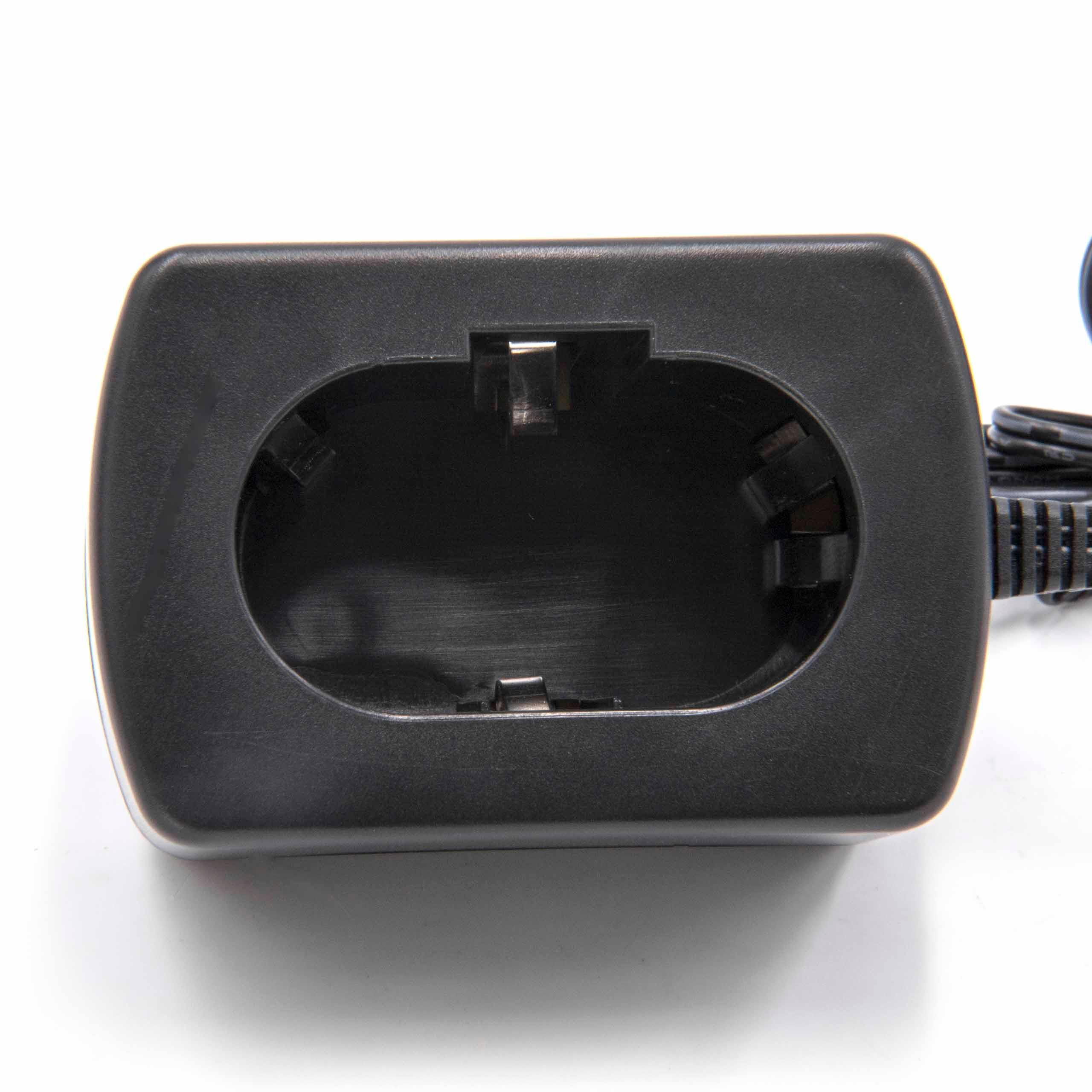Schwarzes Batterieladegerät mit einem zentralen ovalen Hohlraum. Ein schwarzes Kabel ist angebracht. Der Hintergrund ist weiß.