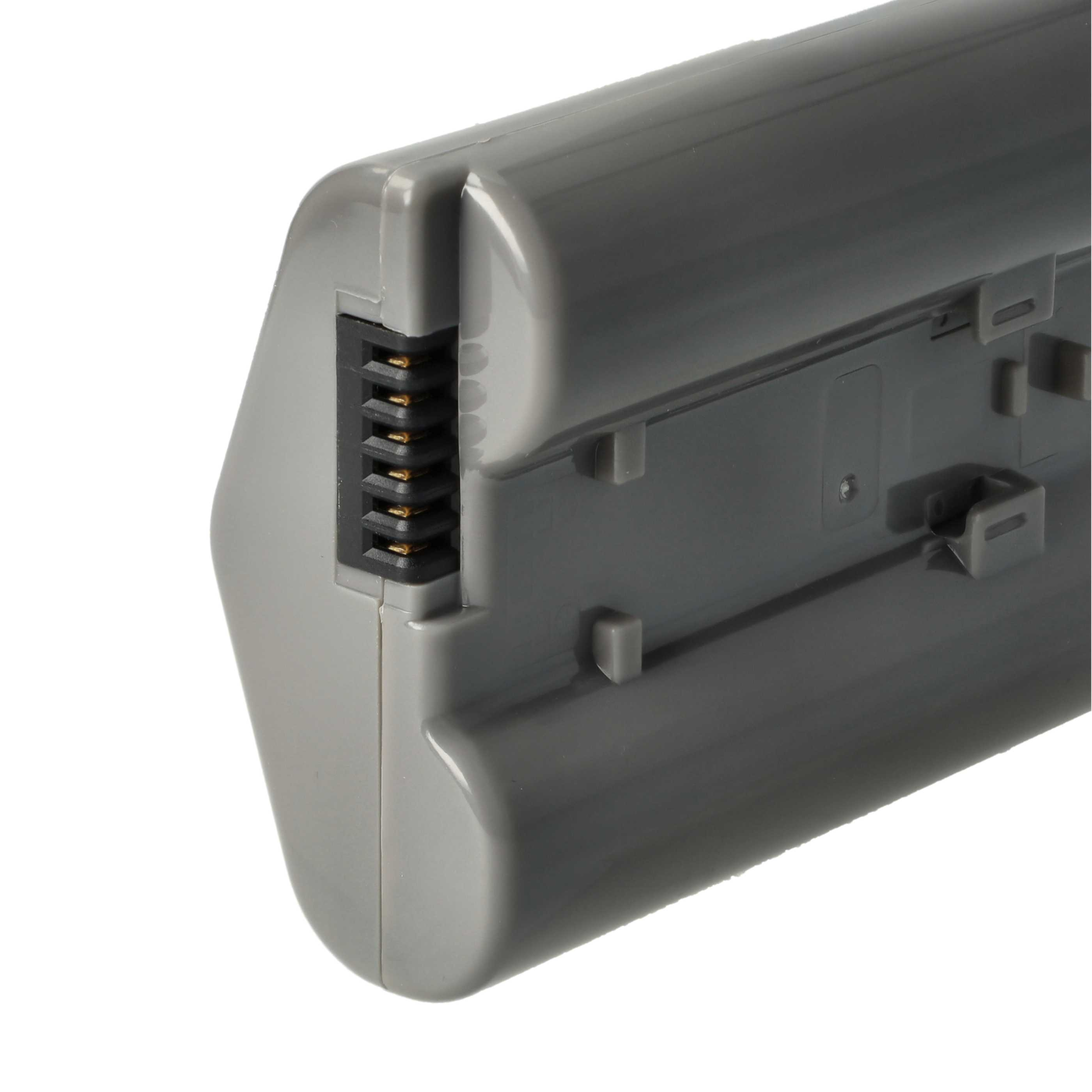 Ein graues Akku-Pack. Die Vorderseite hat einen Stecker mit Goldstiften. Das Pack hat ein glattes, geschwungenes Design mit ein paar Laschen.
