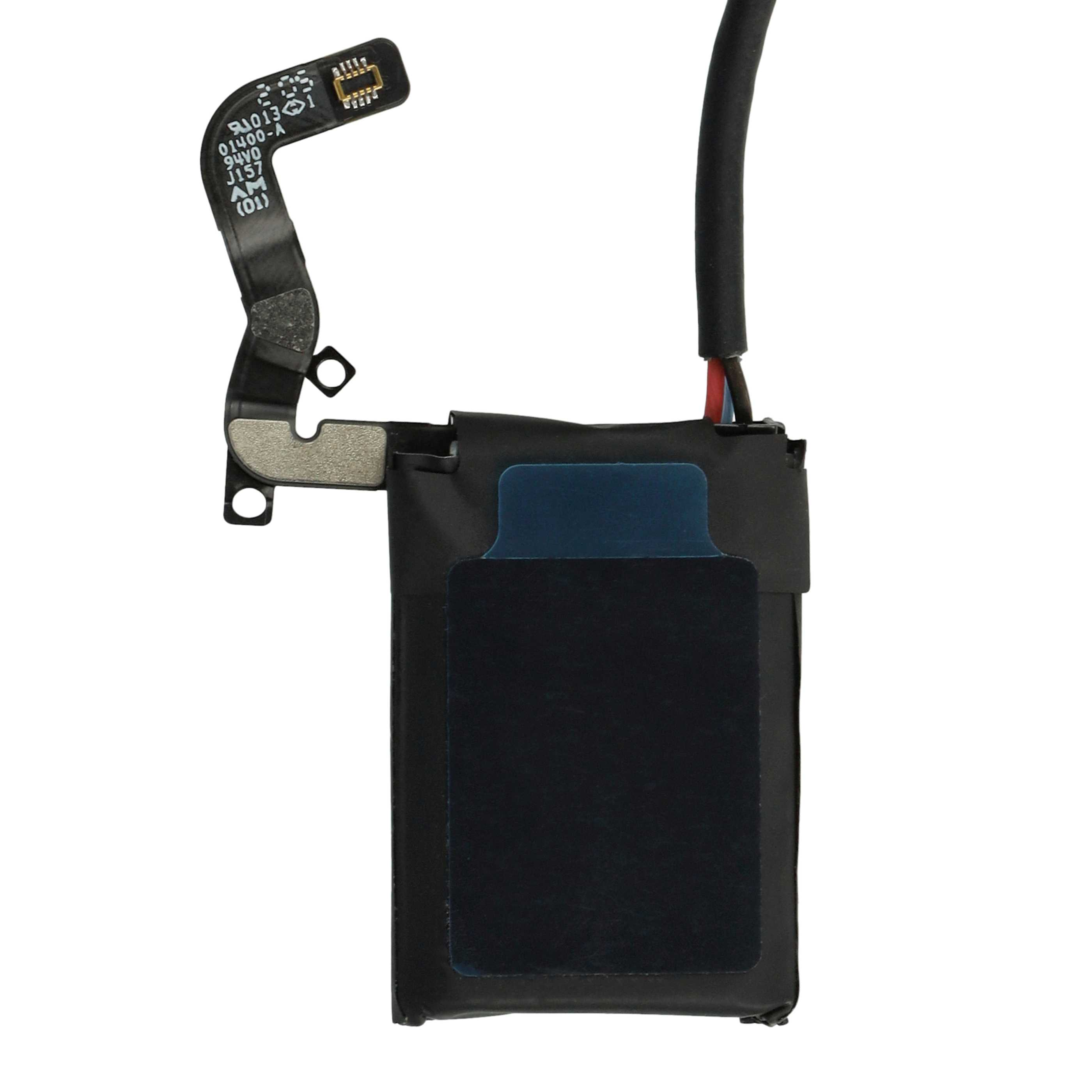 Eine schwarze elektronische Komponente mit einer flexiblen Leiterplatte, die an einer schwarzen Batterie befestigt ist.