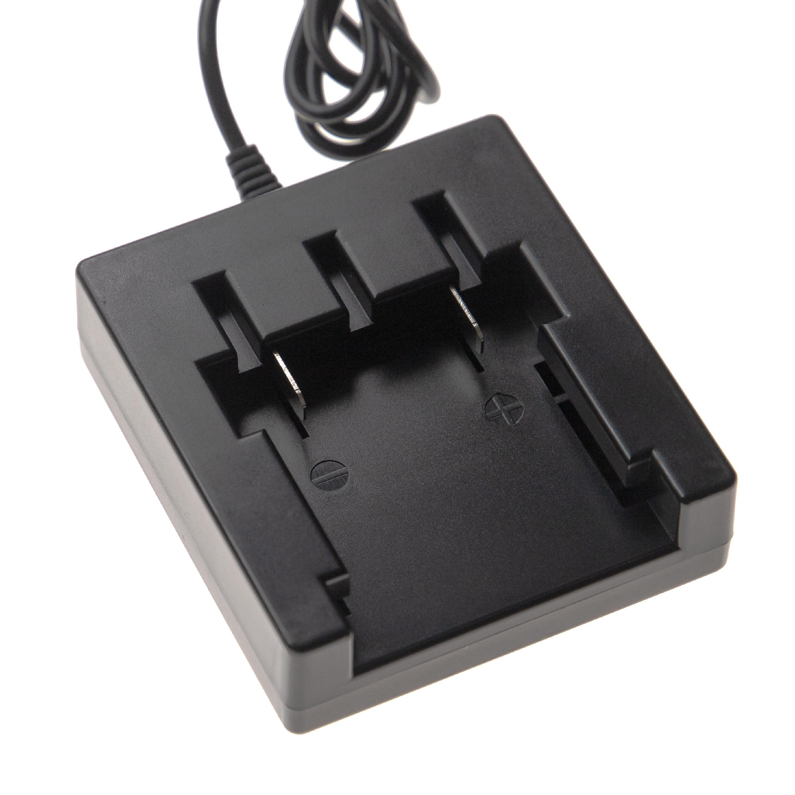 Ein schwarzes Batterieladegerät mit zwei Schlitzen und einem aufgerollten schwarzen Kabel. Der Hintergrund ist weiß.
