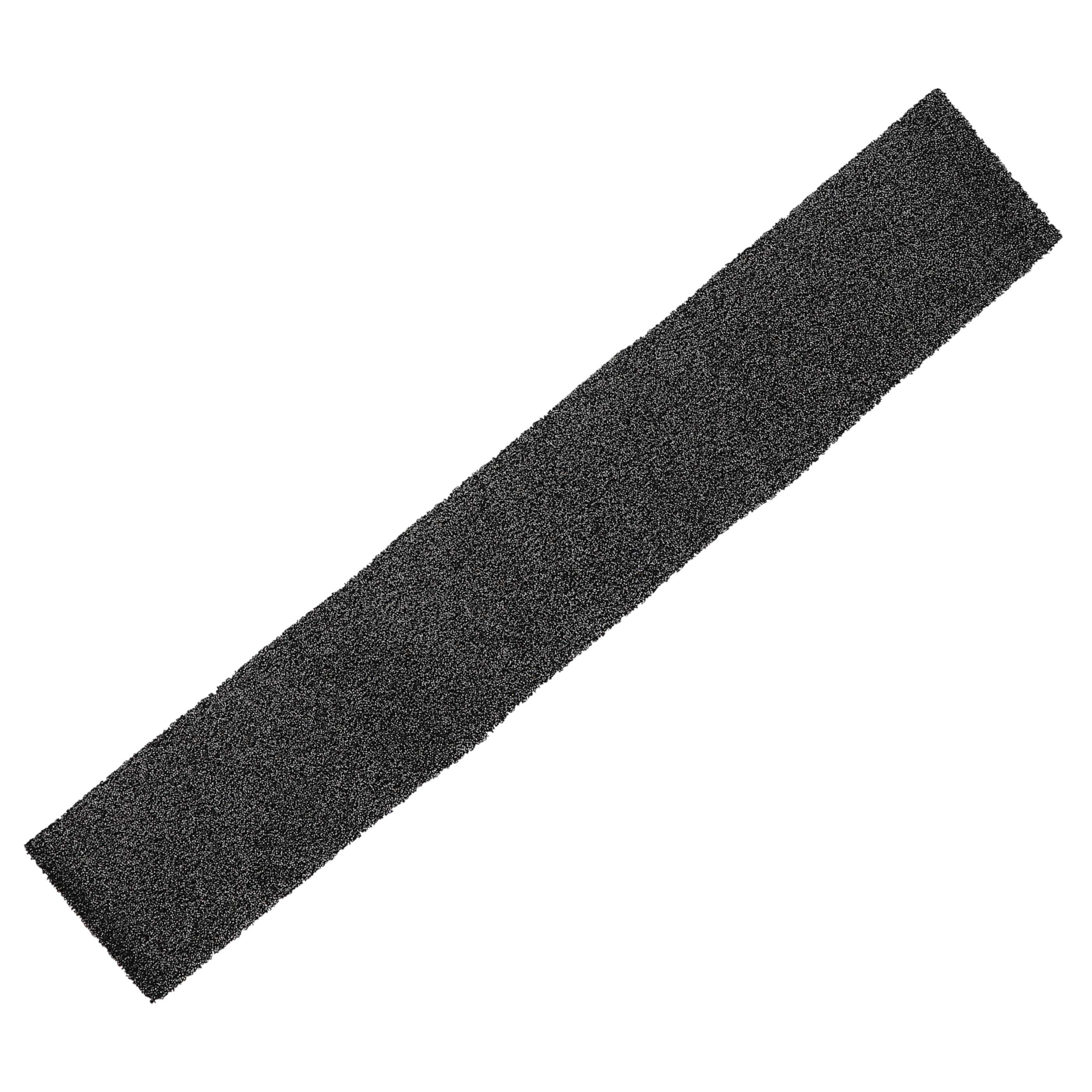 Ein rechteckiges, dunkelgraues, strukturiertes Material liegt diagonal vor einem weißen Hintergrund. Die Textur wirkt rau und porös.