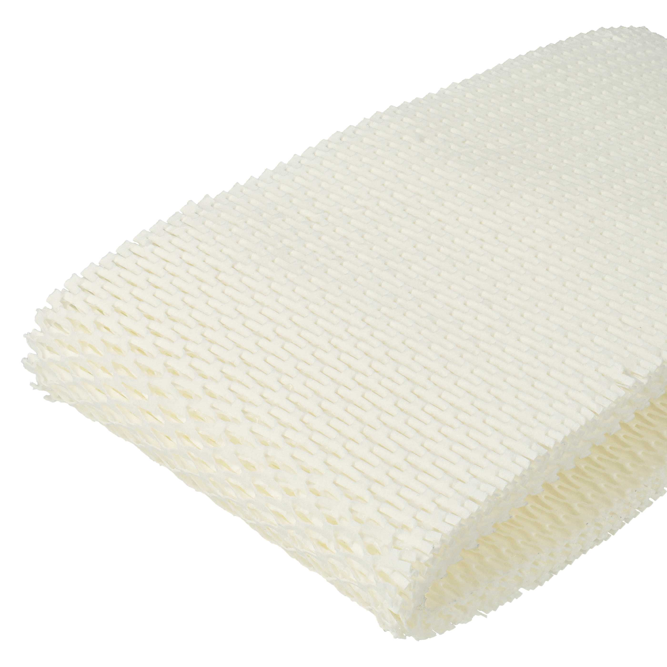 Ein weißer, strukturierter Luftbefeuchterfilter in Wabenform. Der Filter ist rechteckig und hat eine wellige Oberfläche.
