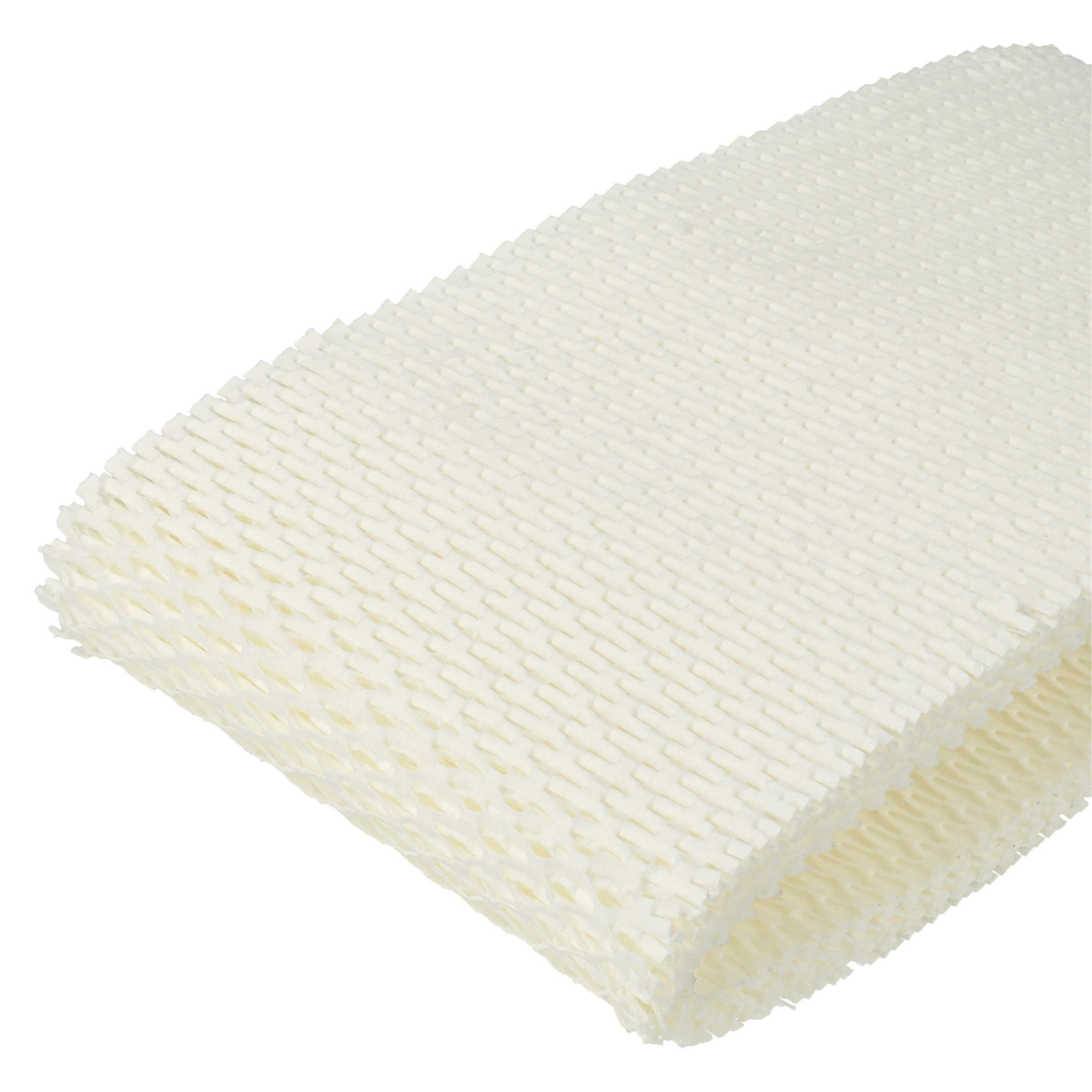 Nahaufnahme eines Stapels weißen, strukturierten, wabenartigen Materials, wahrscheinlich ein Luftbefeuchterfilter.