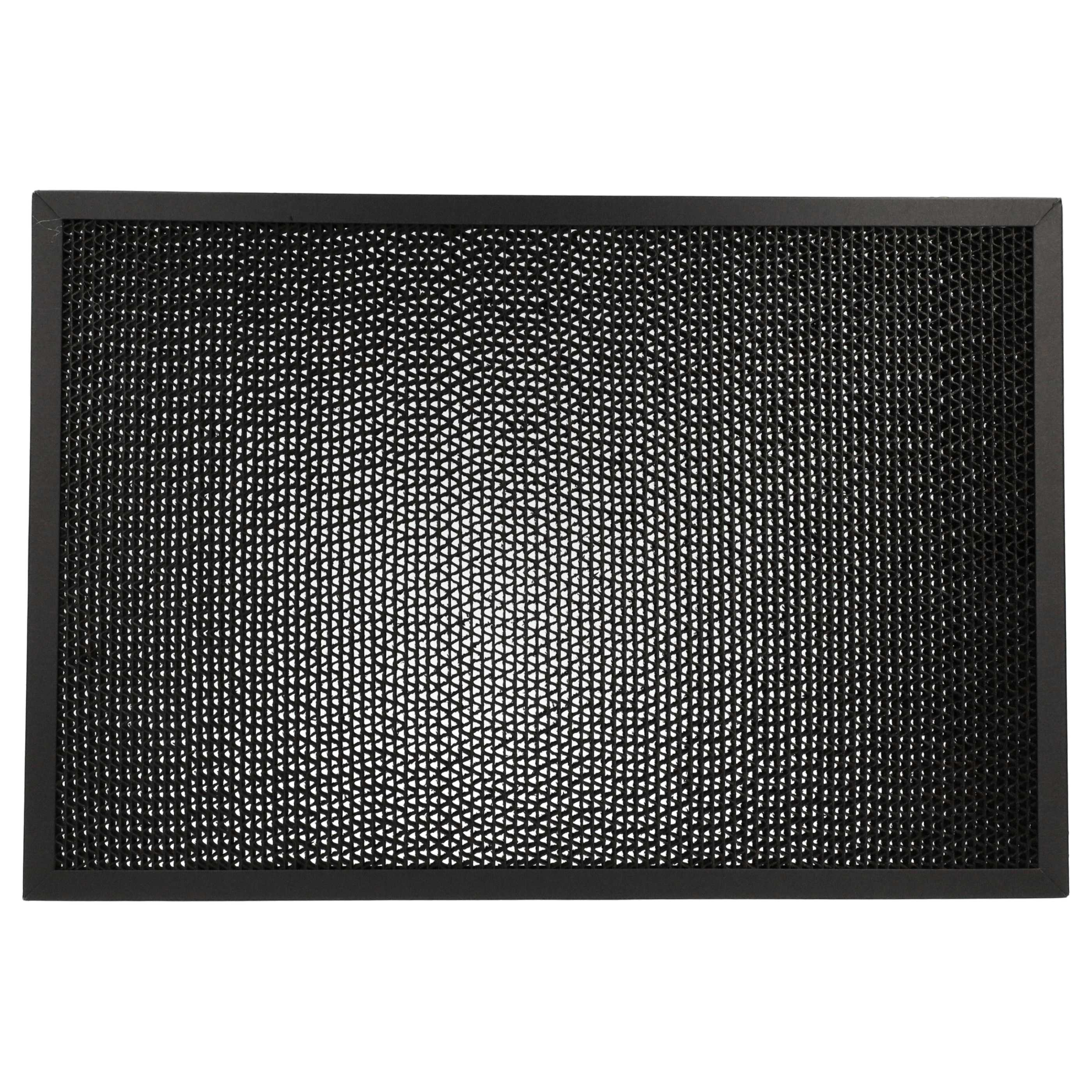 Eine rechteckige, schwarze Gummi-Fußmatte mit einem sich wiederholenden Muster aus kleinen Dreiecken in einem schwarzen Rahmen.