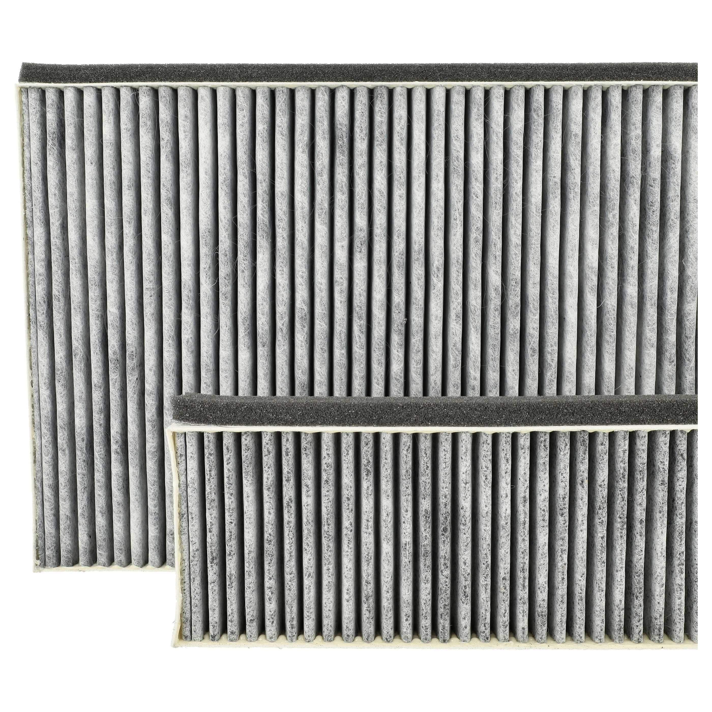 Zwei Kfz-Luftfilter auf weißem Hintergrund. Sie sind grau mit schwarzem Rand.