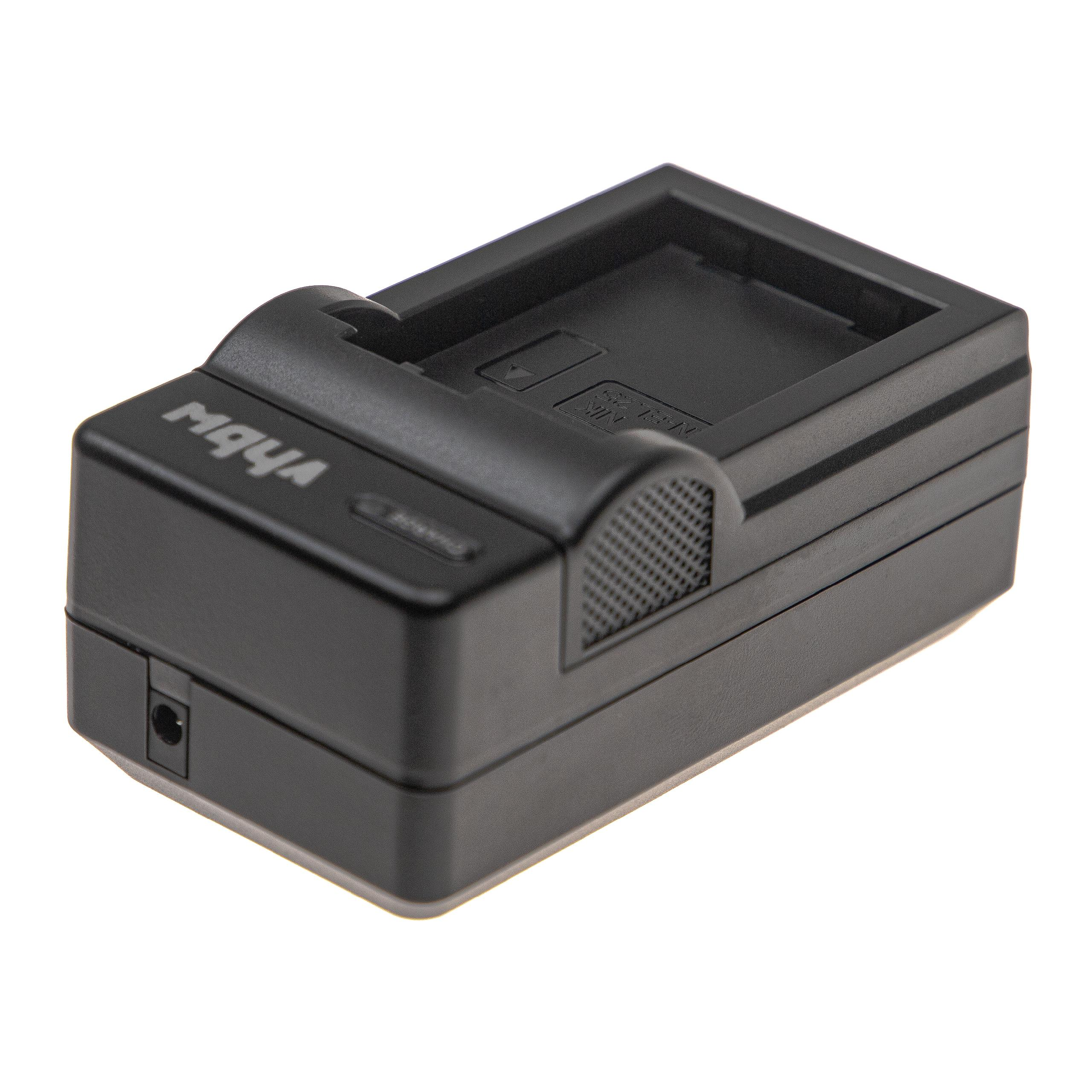 Ein schwarzes Batterieladegerät mit dem Wort "M4YA" darauf. Es hat eine rechteckige Form und eine Öffnung oben.