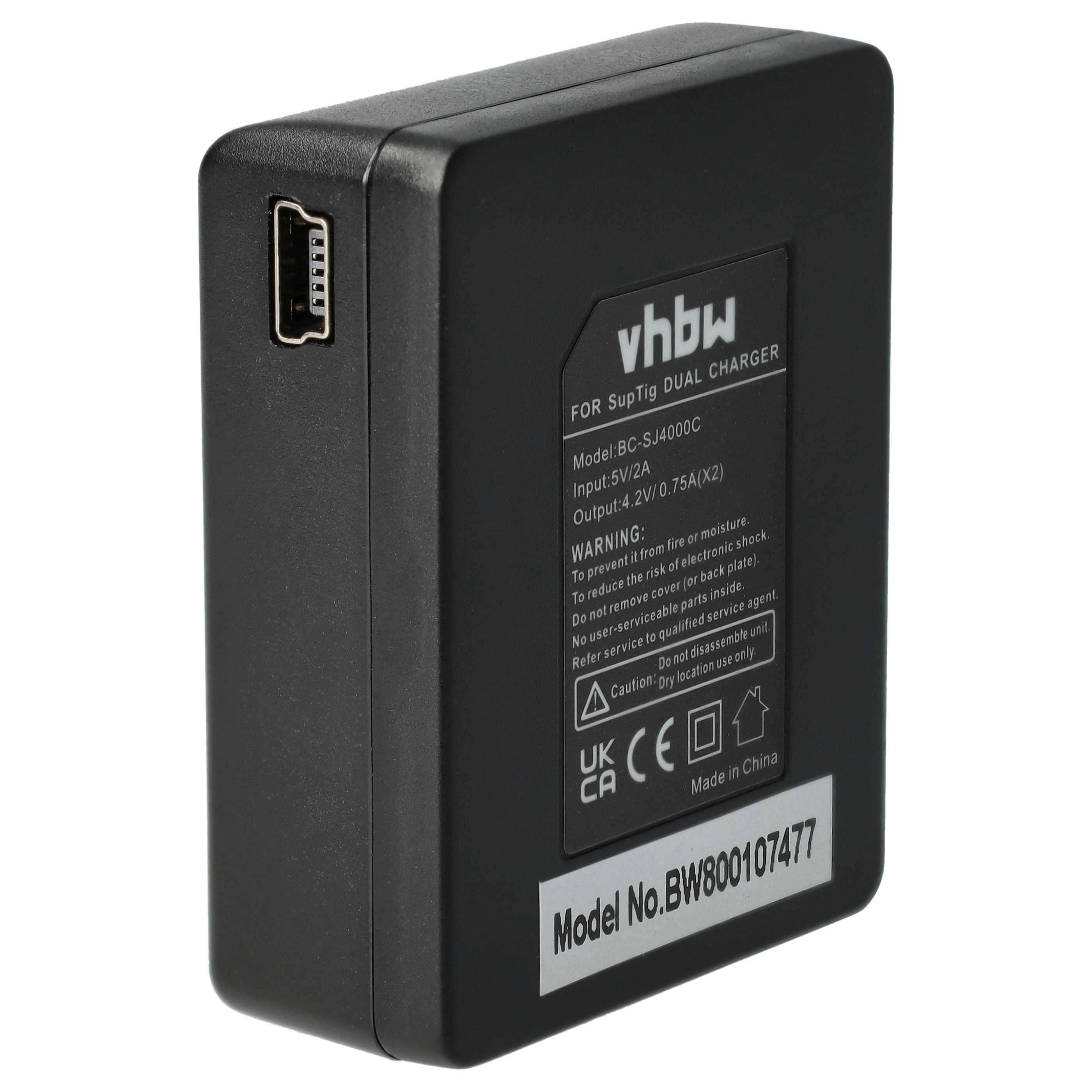 Schwarzes Ladegerät mit Etikett. Es hat Text wie 'Dual Charger', Modell- und Warnhinweise.