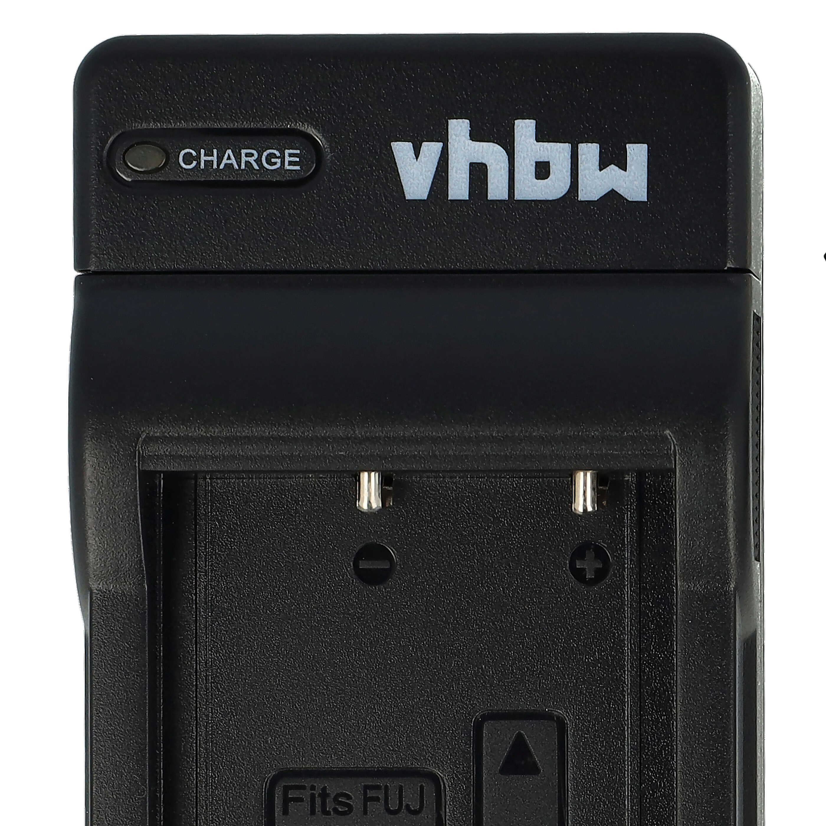 Ein schwarzes Batterieladegerät mit dem Logo "vhbw". Es hat eine Ladeanzeige und einen Steckplatz für eine Batterie mit der Aufschrift "Fits FUJ".