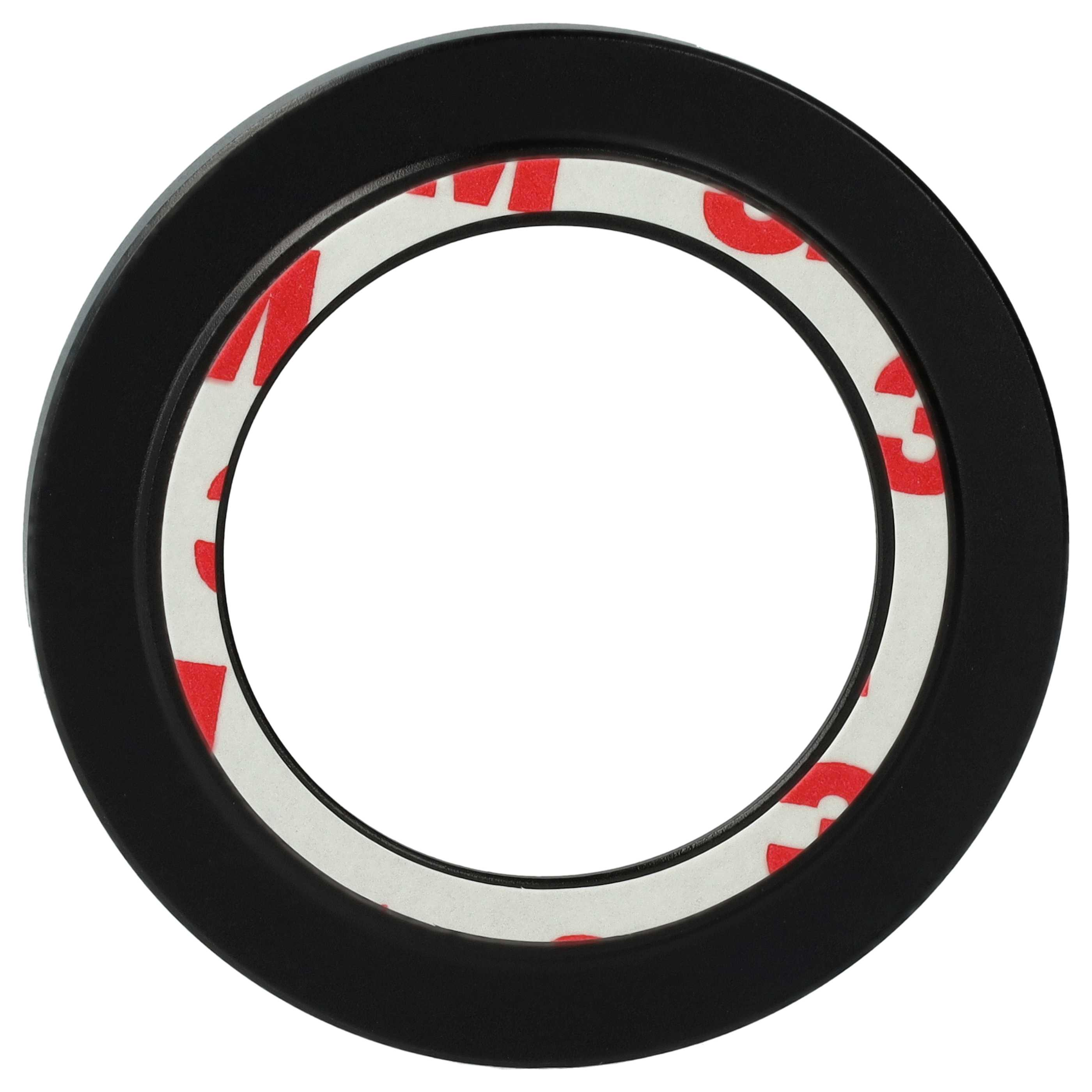 Ein schwarzes kreisförmiges Objekt mit weißem und rotem Muster im Inneren. Die Mitte ist leer und bildet einen Ring.