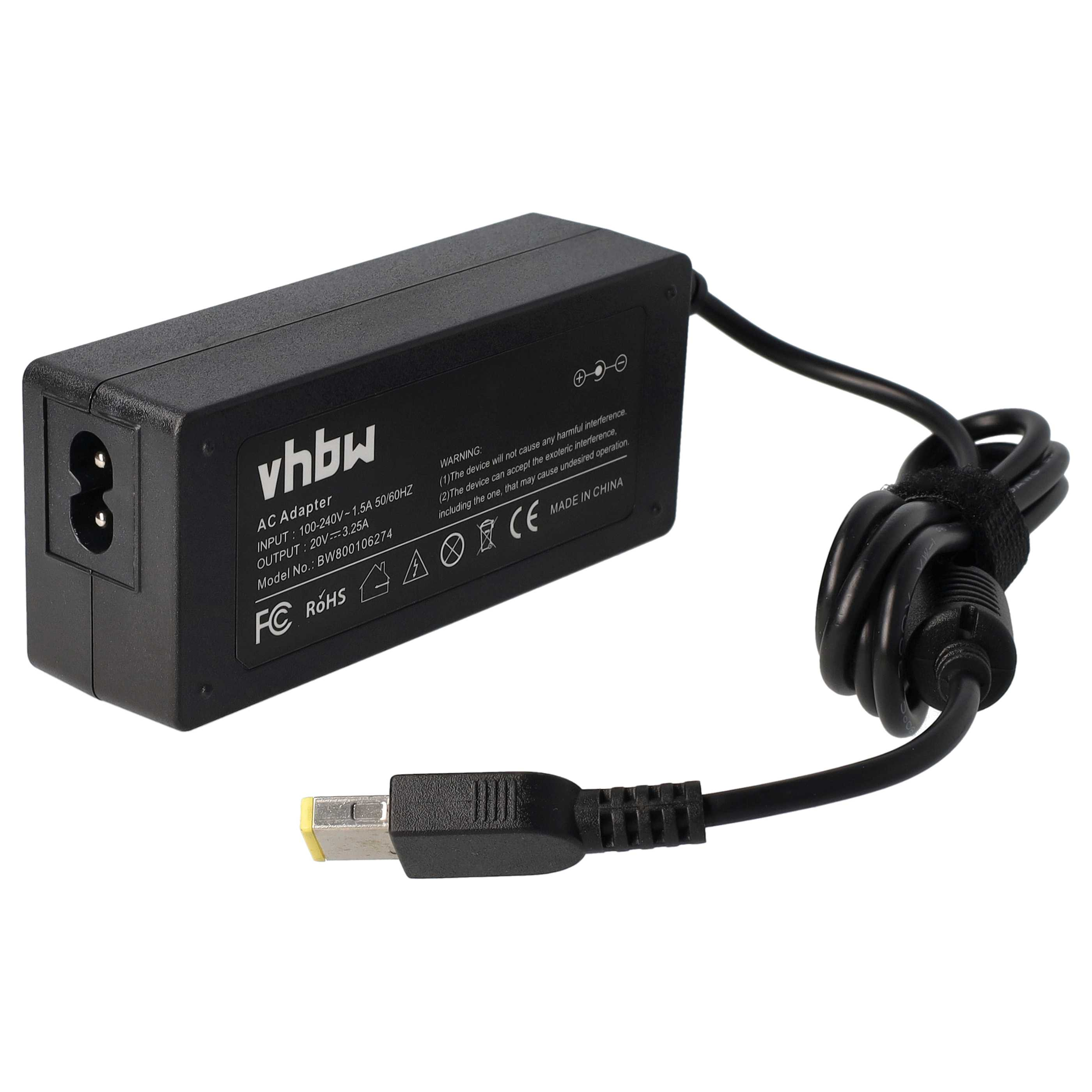 Schwarzes Laptop-Netzteil mit Netzkabel. Das Netzteil hat Text und Symbole. Das Kabel hat einen USB-Anschluss.