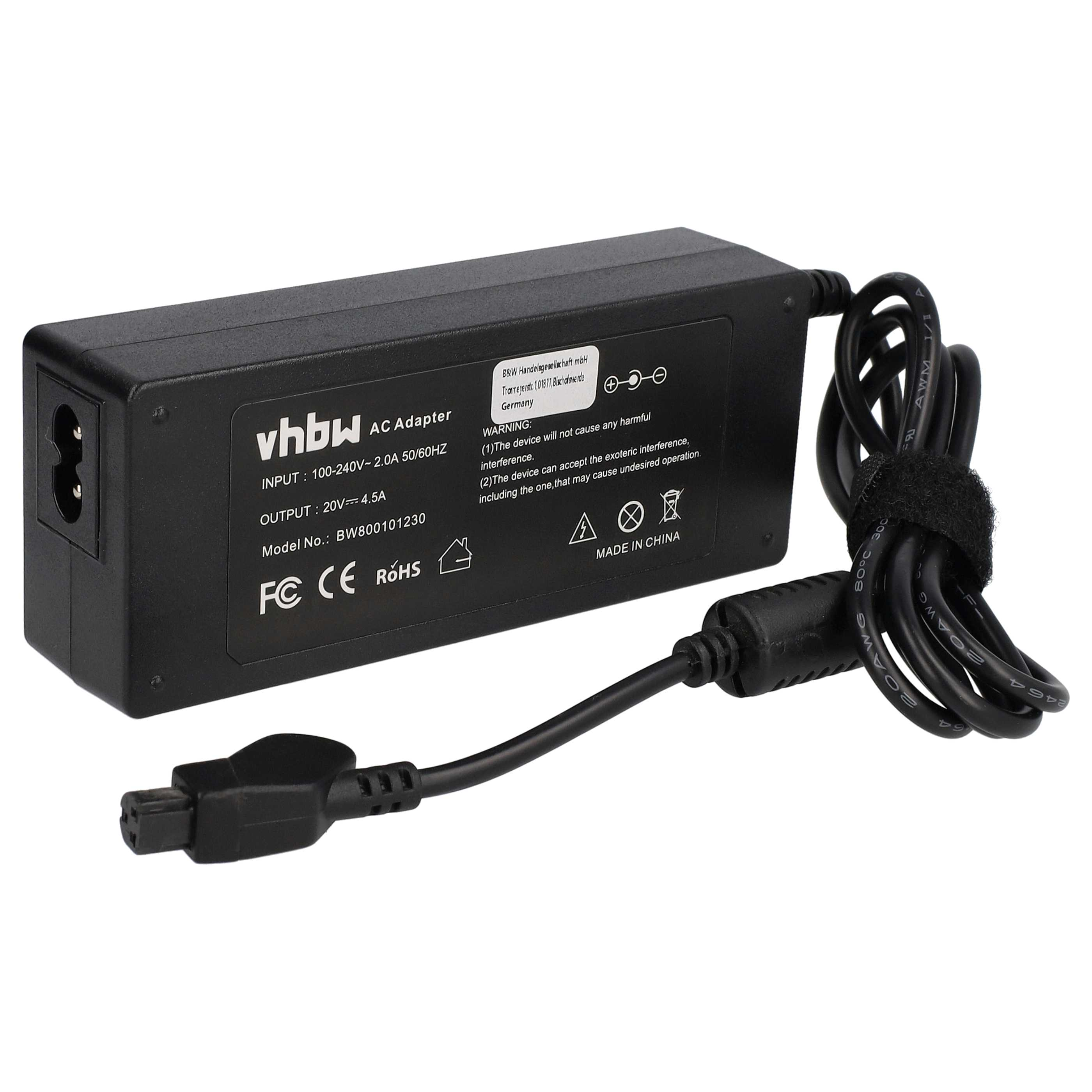 Schwarzes vhbw AC-Netzteil mit Etikett. Es hat ein Netzkabel und einen Stecker. Text enthält Eingangs-, Ausgangs- und Modellinformationen.