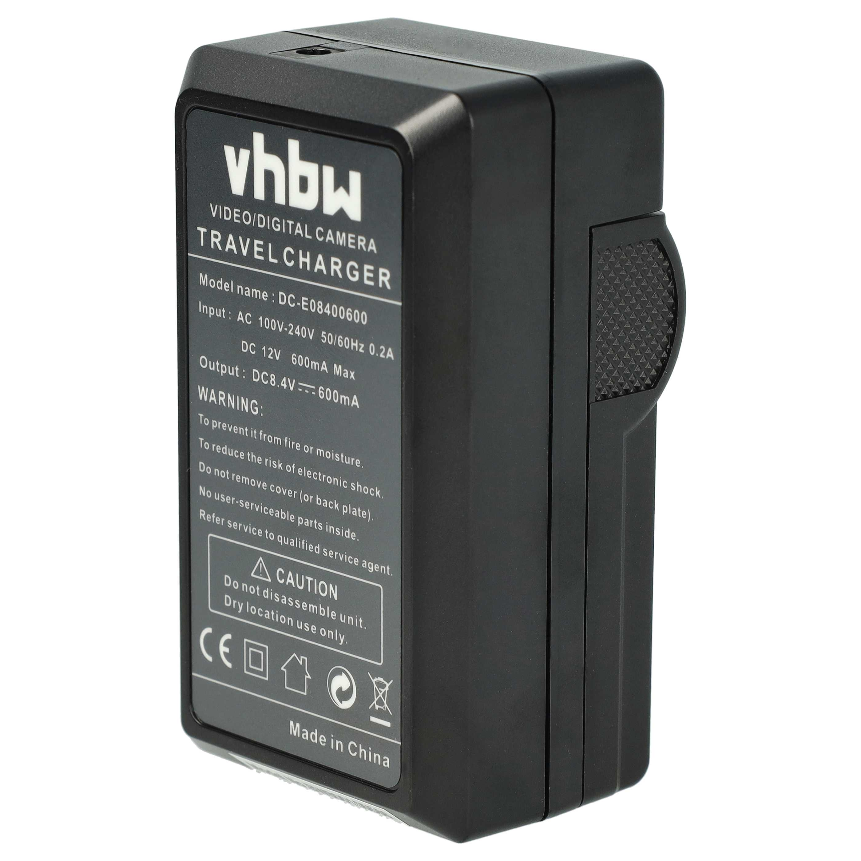 Ein schwarzes vhbw-Reiseladegerät für Digitalkameras. Es hat Text darauf und eine strukturierte Seitenverkleidung. Der Hintergrund ist weiß.