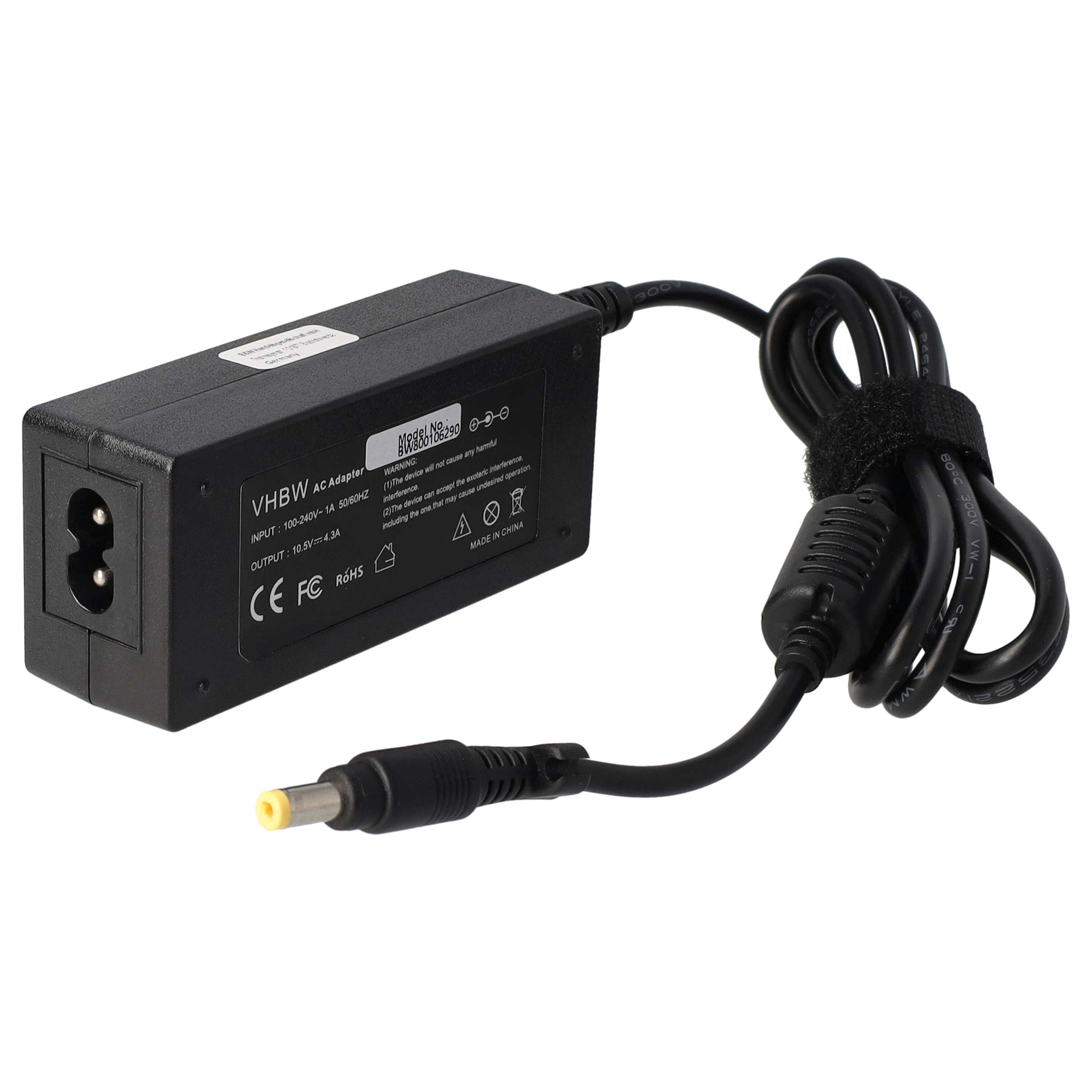 Schwarzes VHBW-Netzteil mit schwarzem Kabel und gelbem Stecker. Das Kabel ist geschlungen und mit einem schwarzen Riemen befestigt.