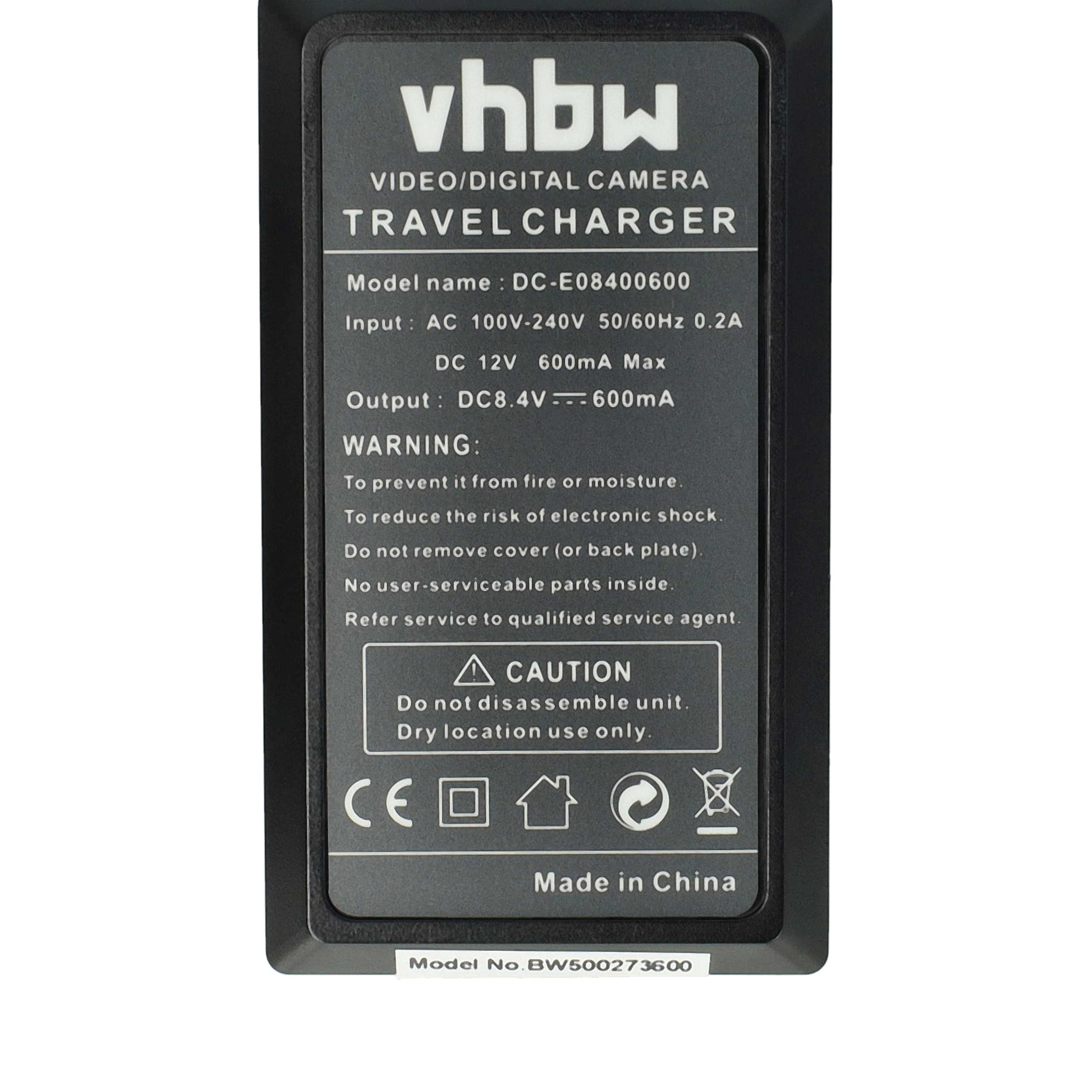 Schwarzes vhbw-Reiseladegerät mit Text, Warnungen und Spezifikationen. Enthält Modellnummer und Made in China.